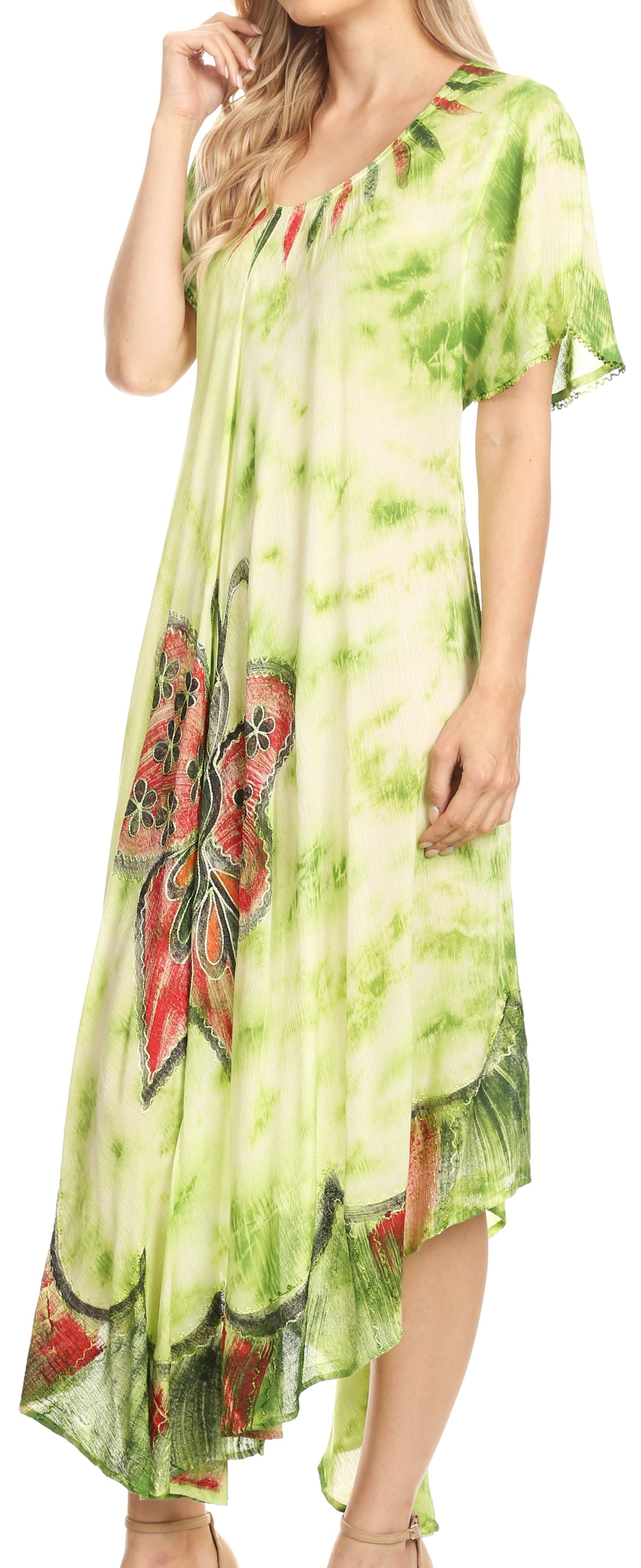 Woman wearing a green floral dress with a blurred background