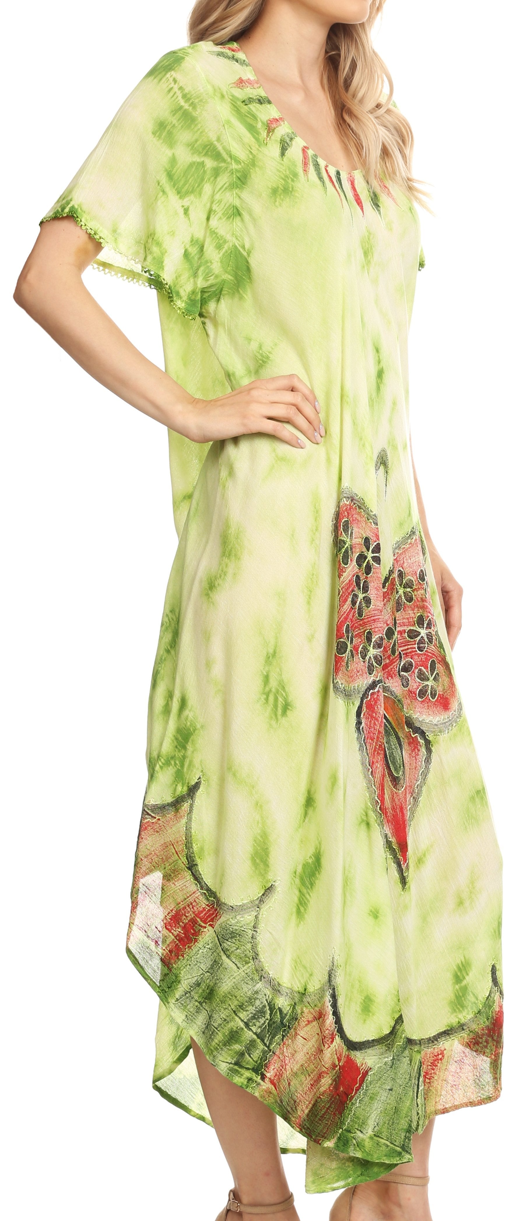 Woman wearing a green floral dress with a white background