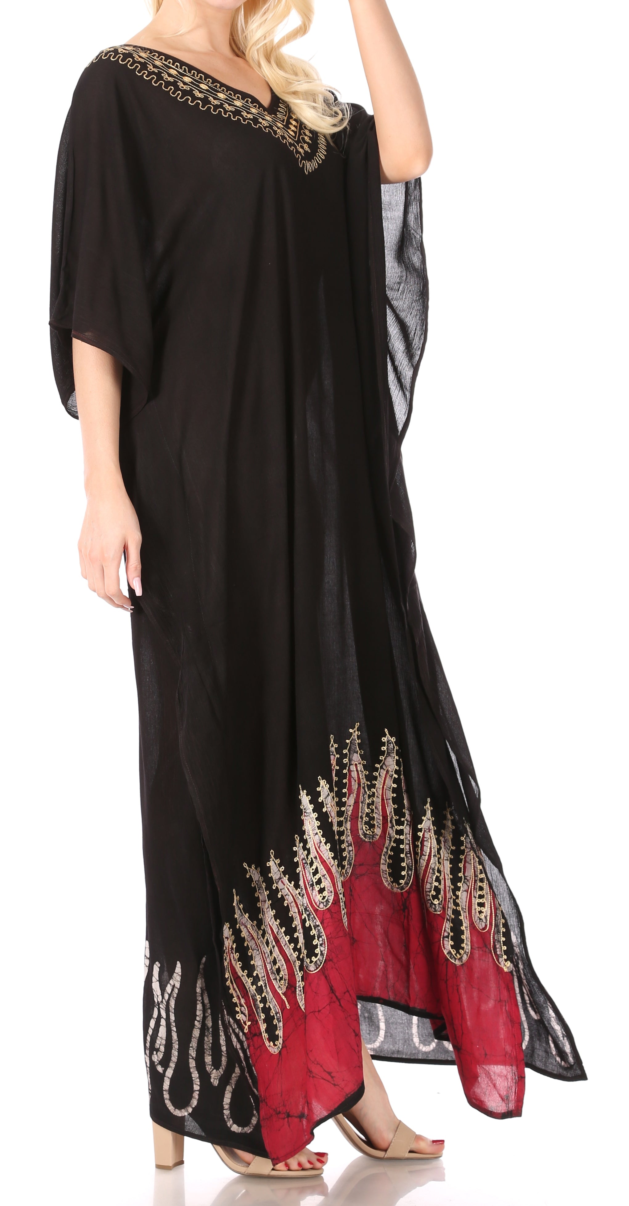 Black dress with red and gold embroidery on a white background