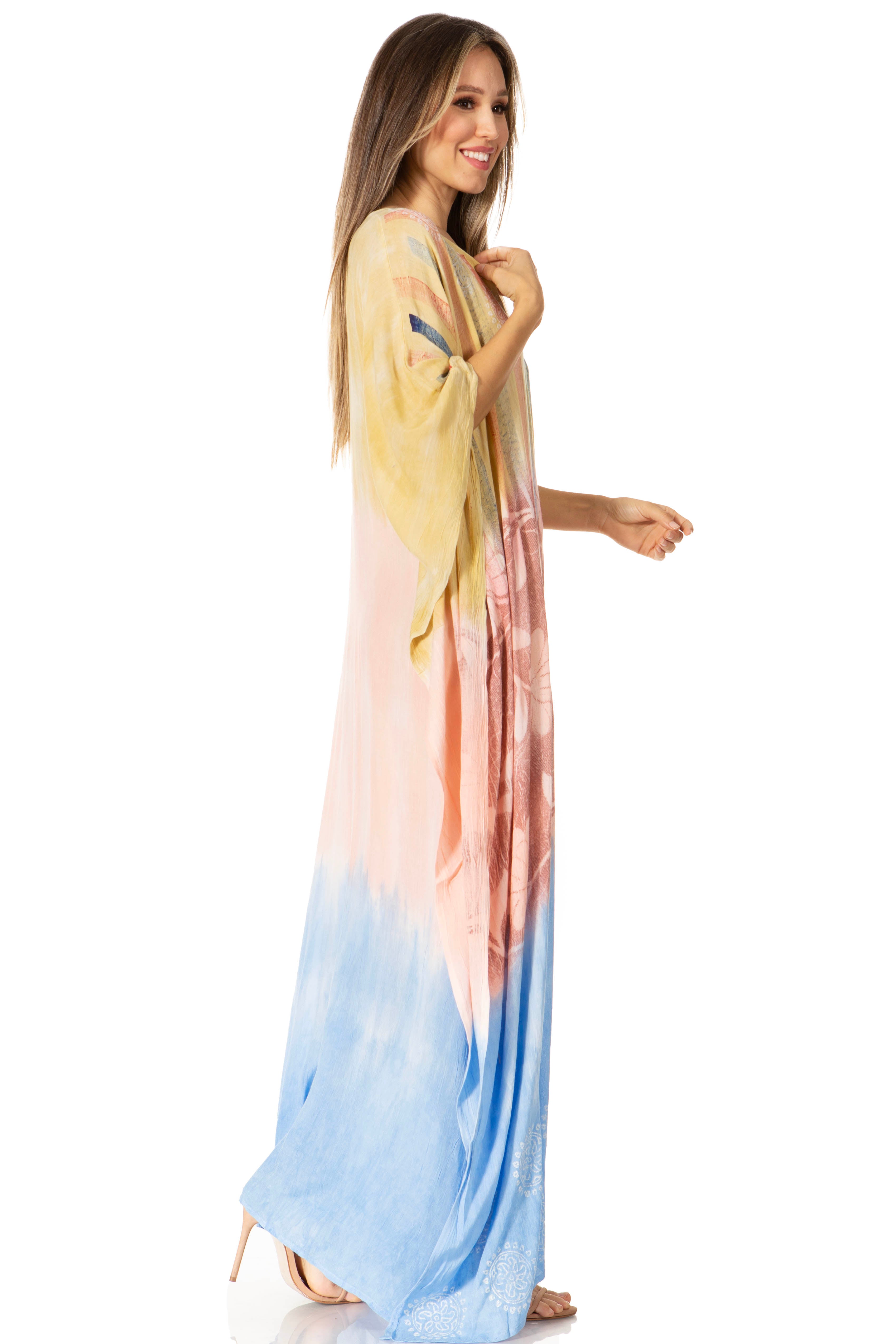 Woman wearing a colorful gradient dress on a white background