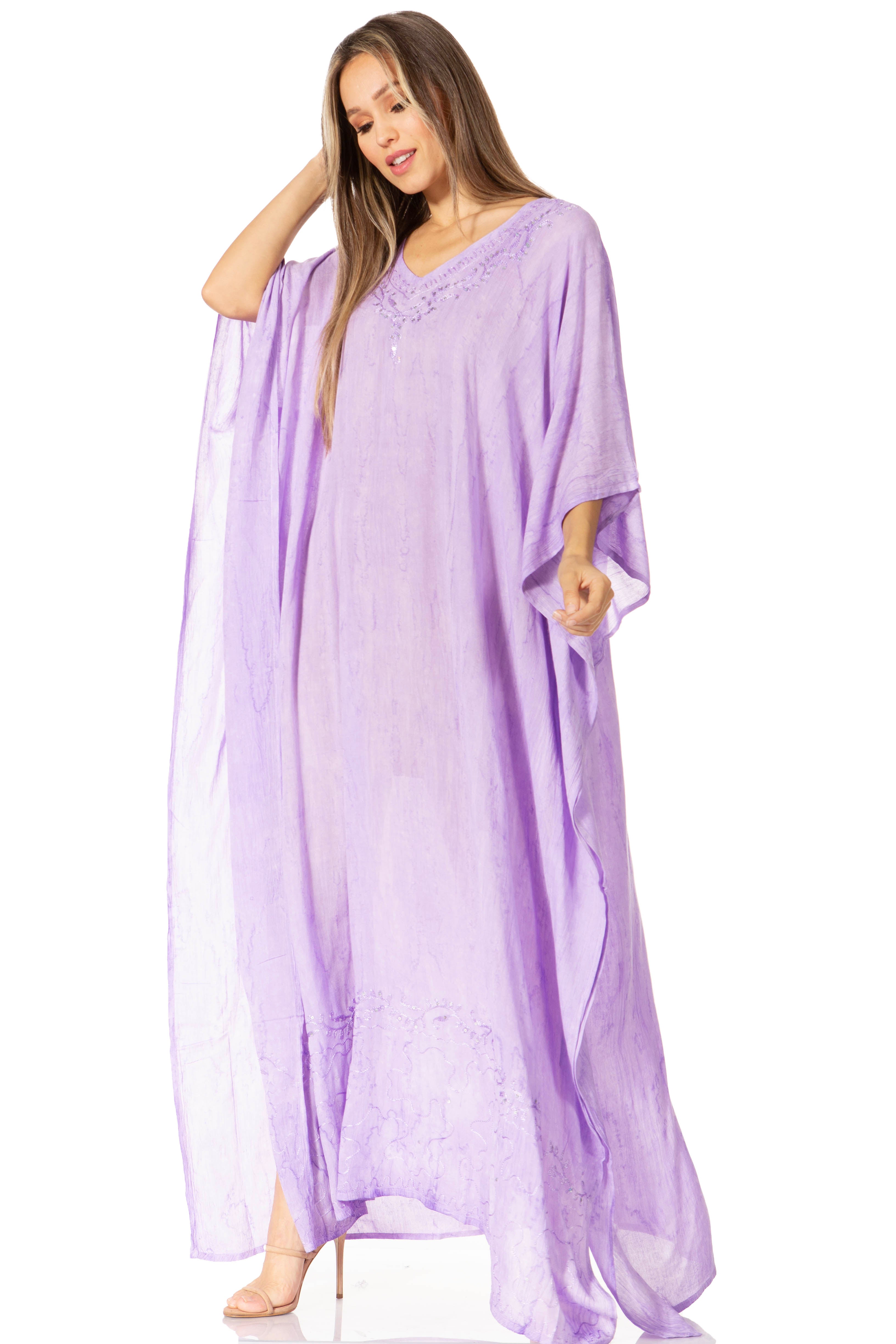 Woman wearing a long purple dress on a white background