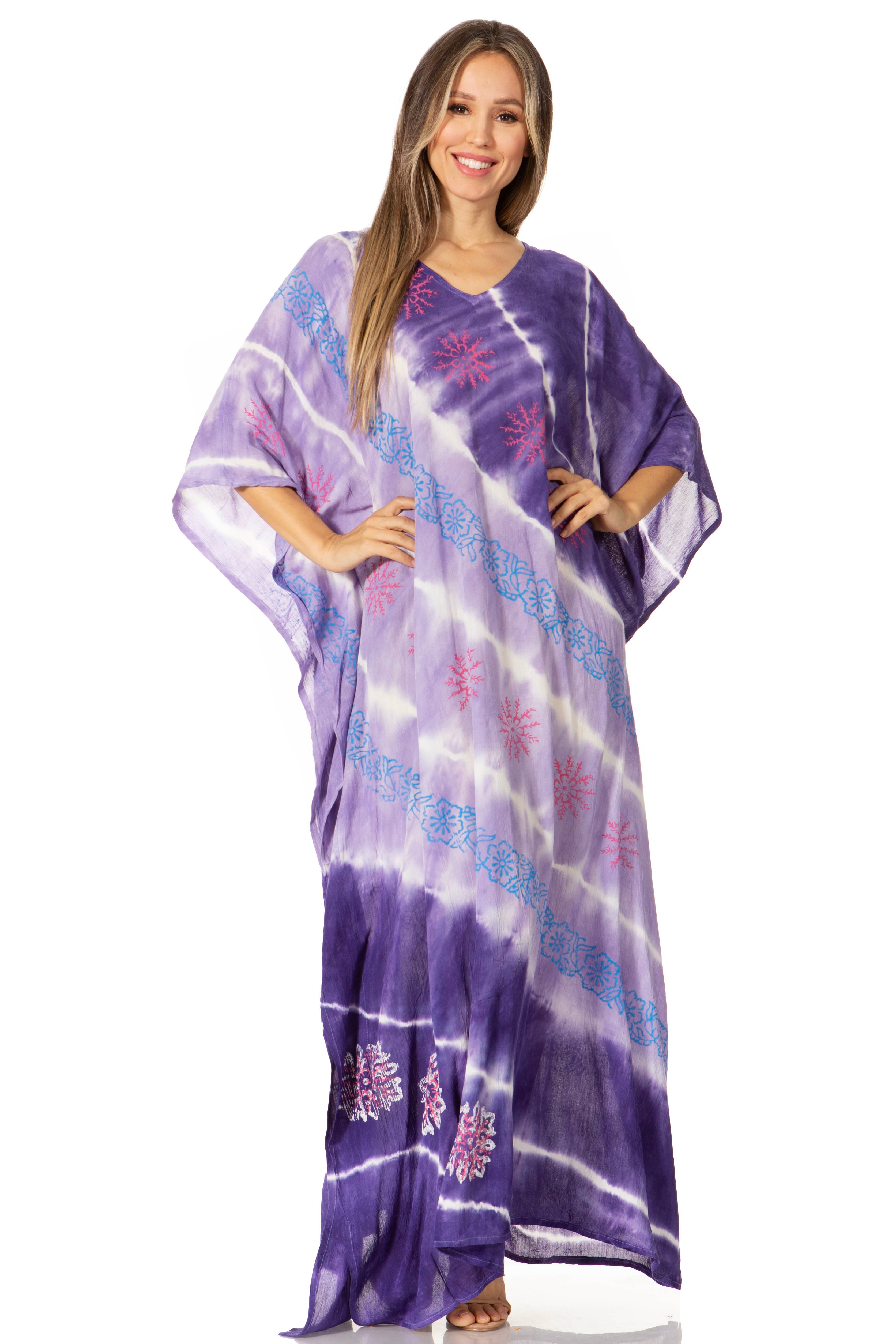 Woman wearing a purple tie-dye dress on a white background