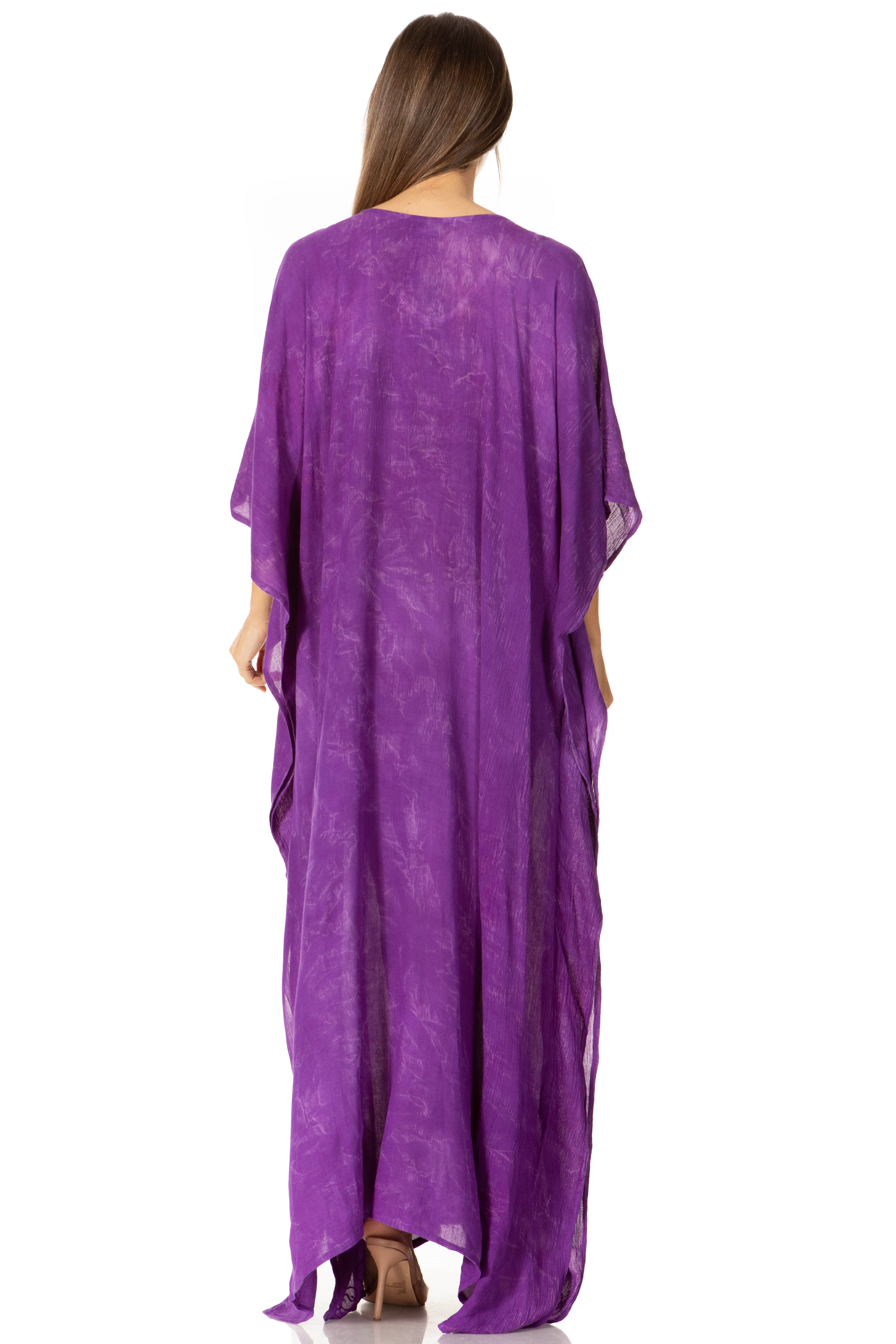 Purple caftan worn by a model on a white background