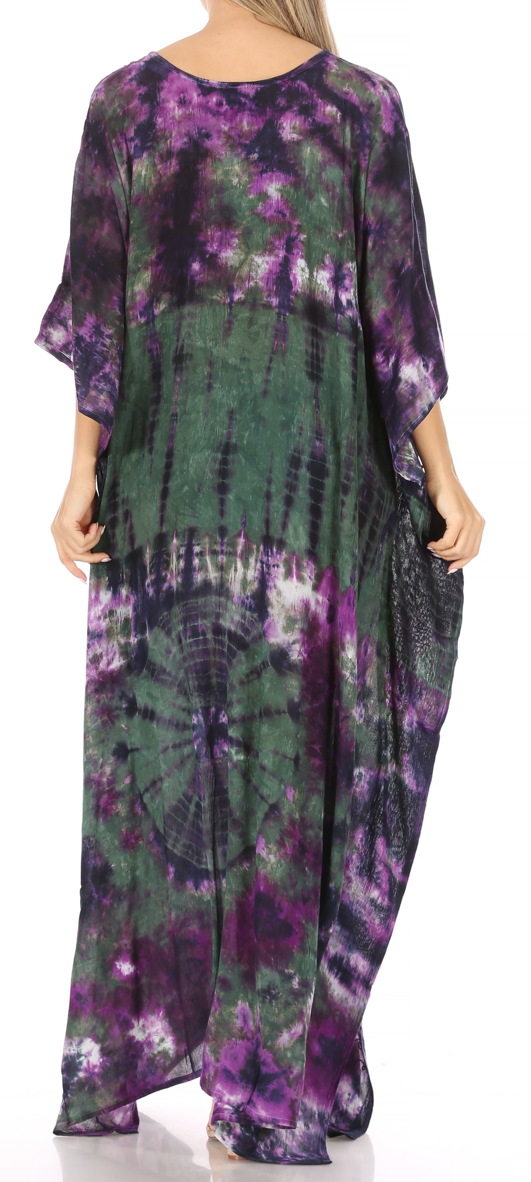 Tie-dye dress with purple and green pattern worn by a person
