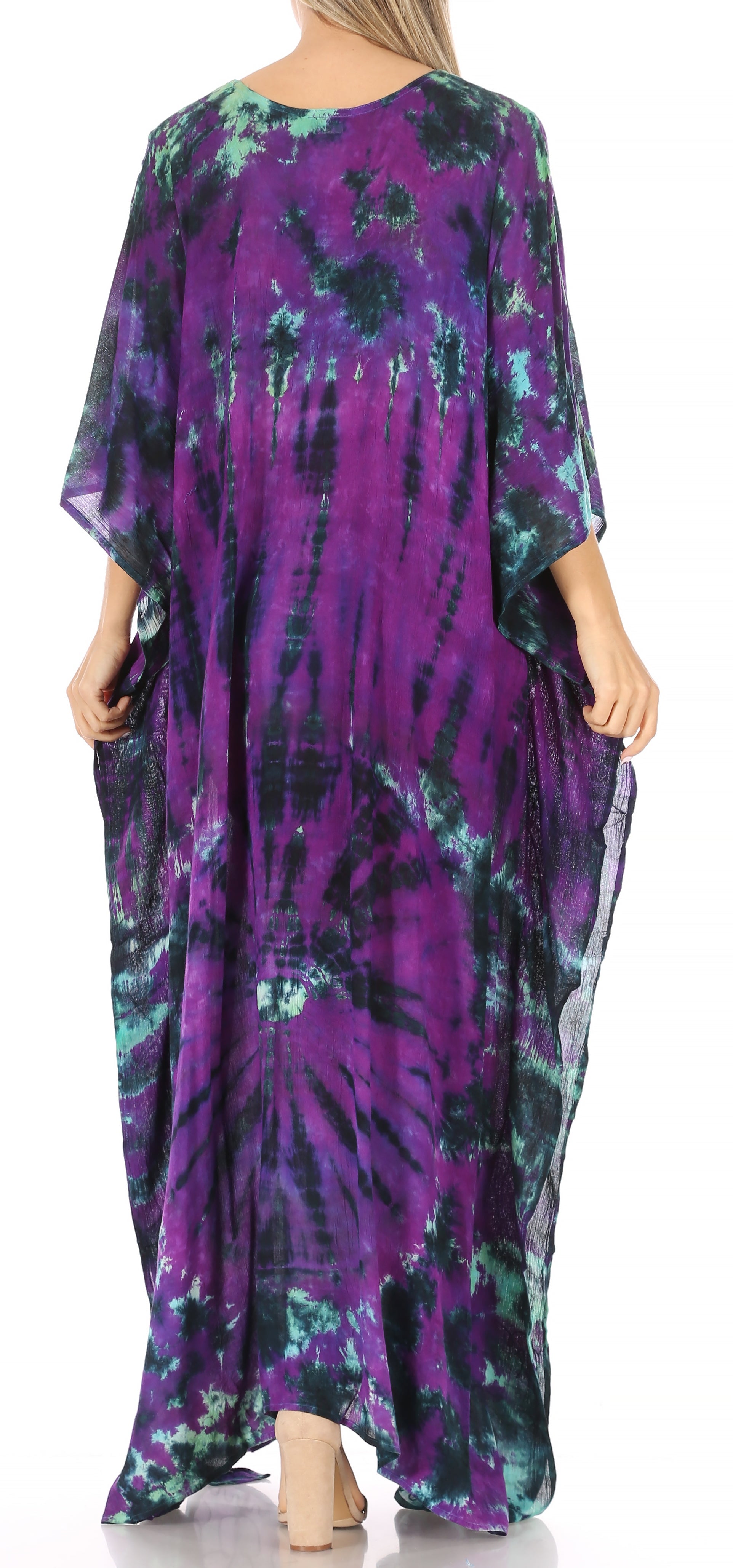 Purple tie-dye dress worn by a model on a white background