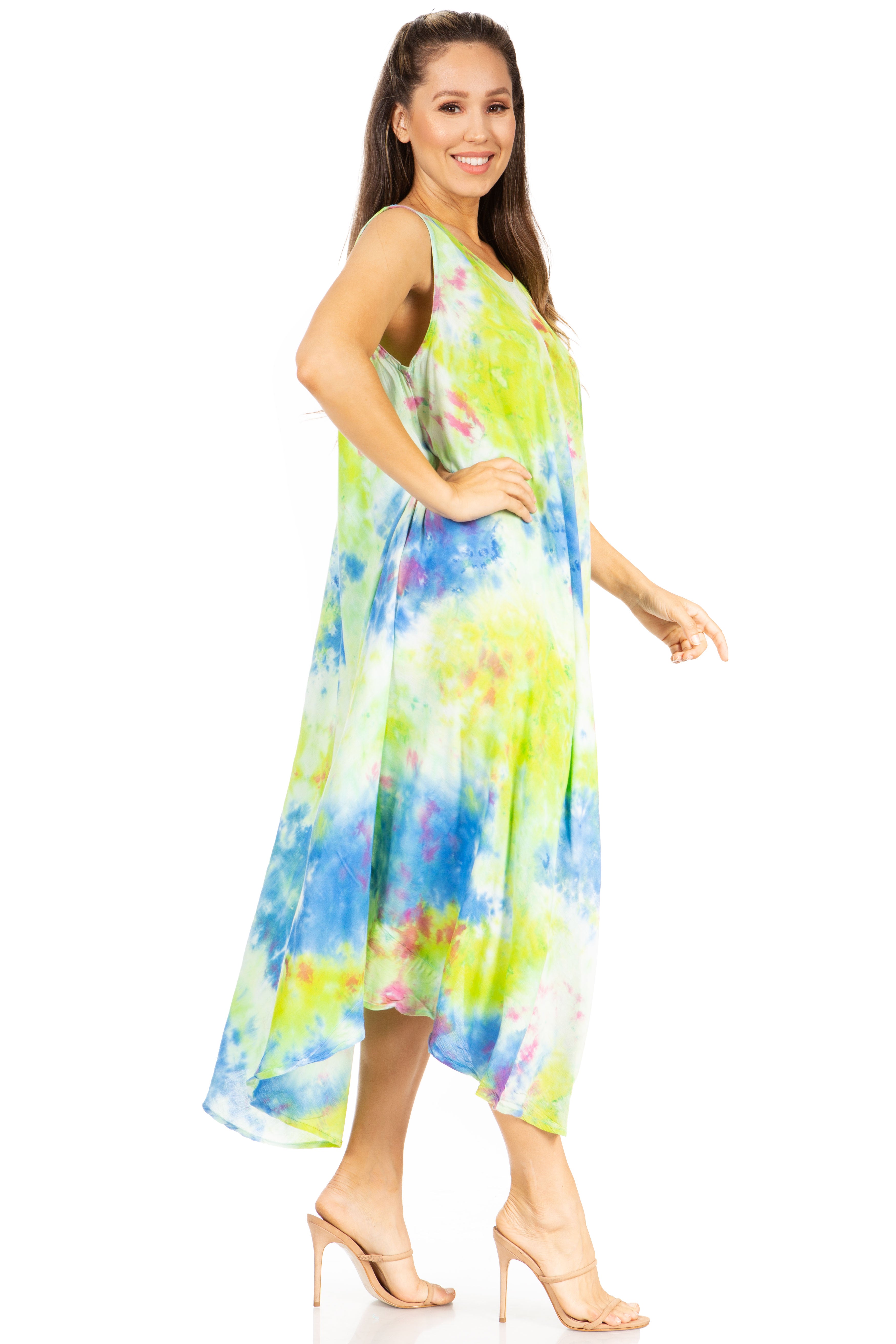 Woman wearing a colorful tie-dye dress on a white background