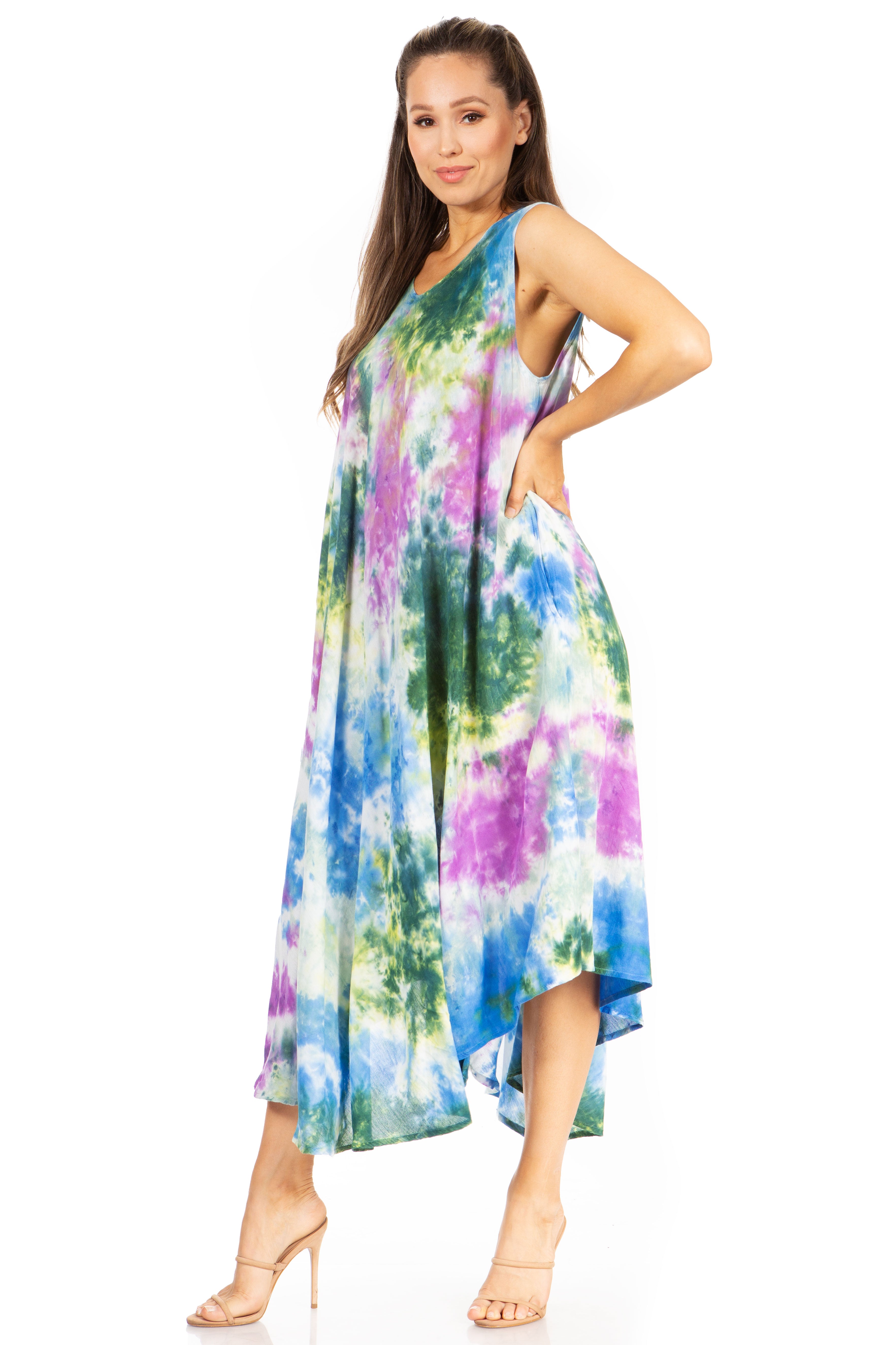 Woman wearing a colorful tie-dye dress on a white background