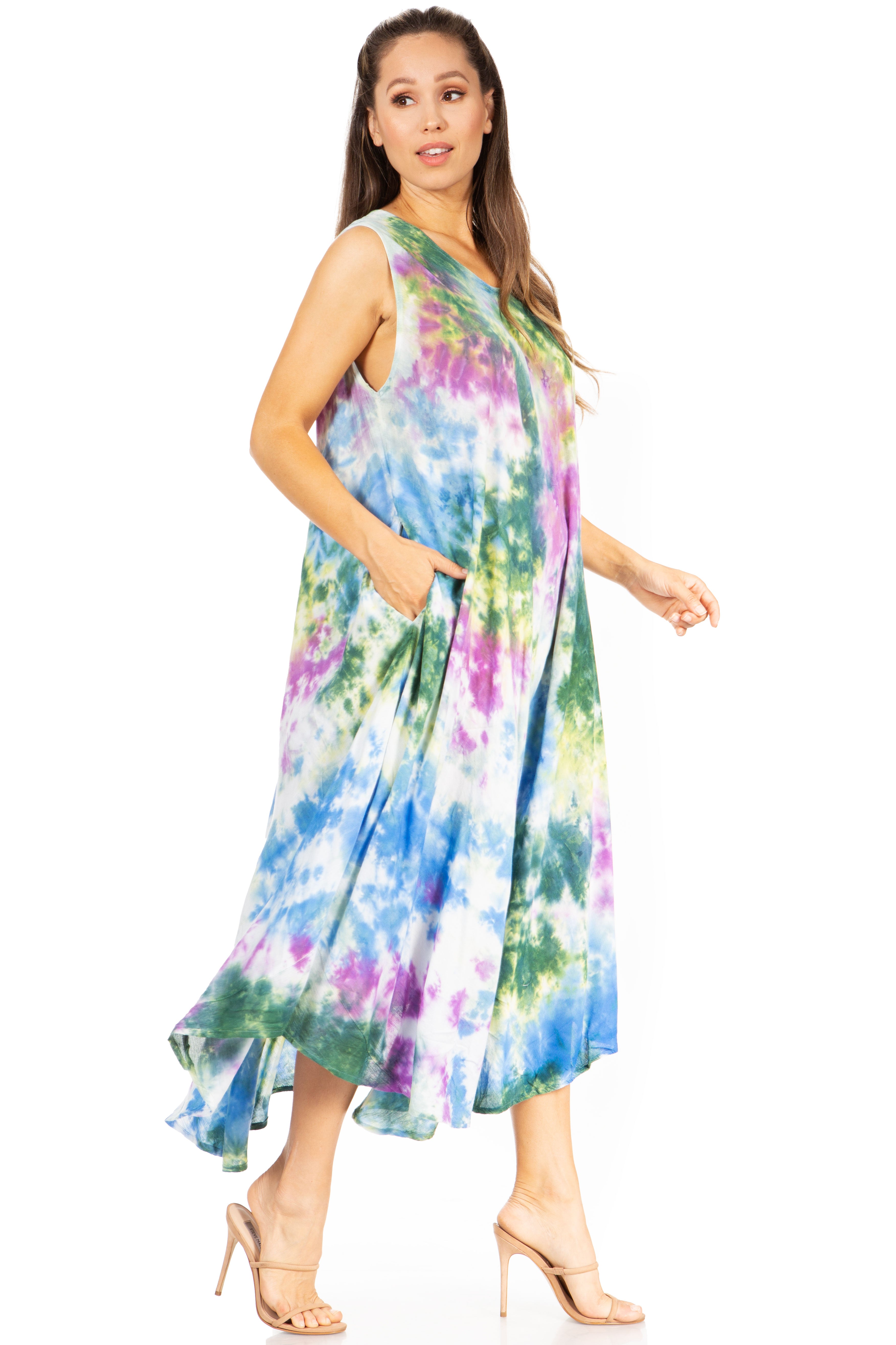 Woman wearing a colorful tie-dye dress on a white background