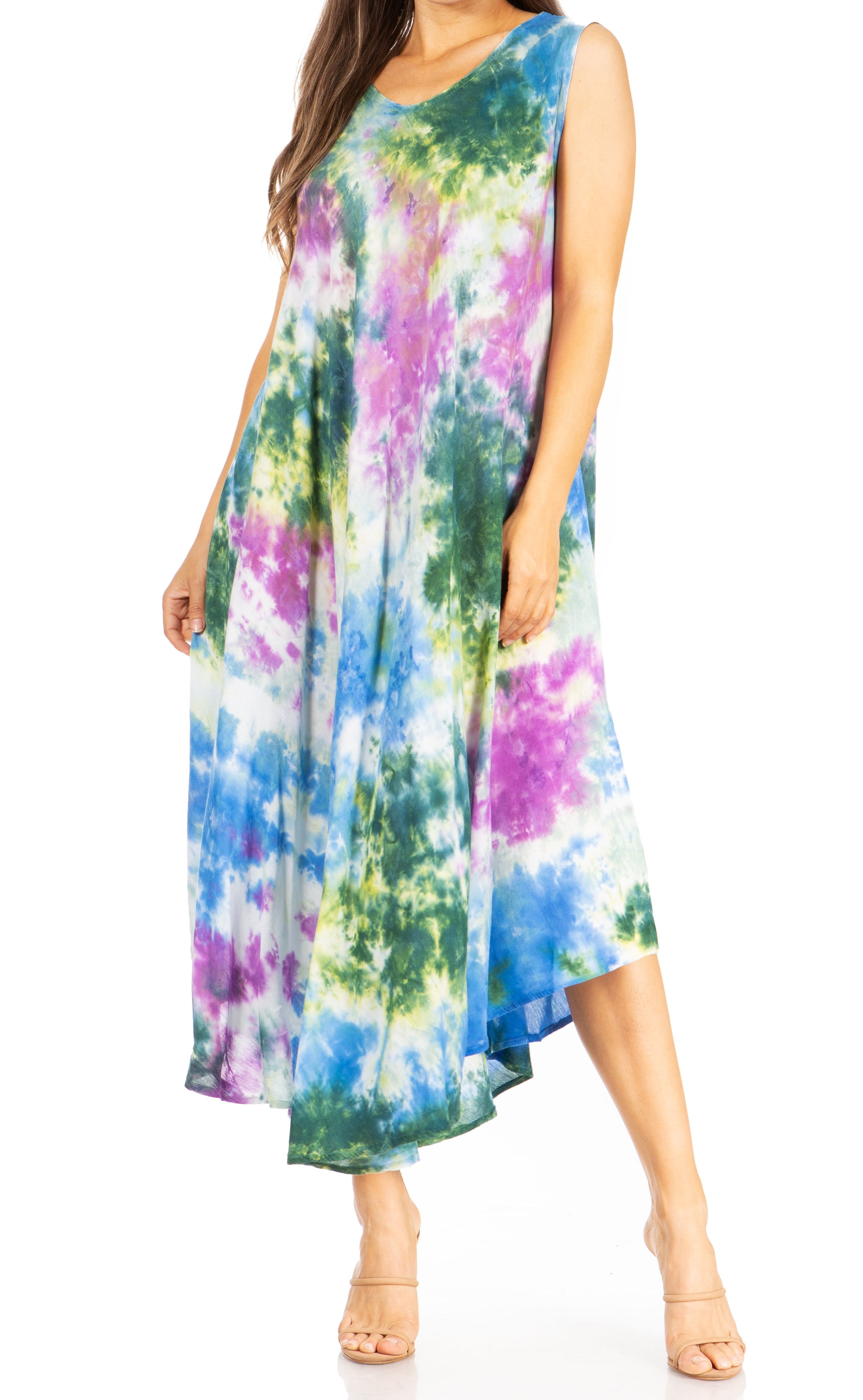 Multicolored tie-dye dress worn by a model on a white background
