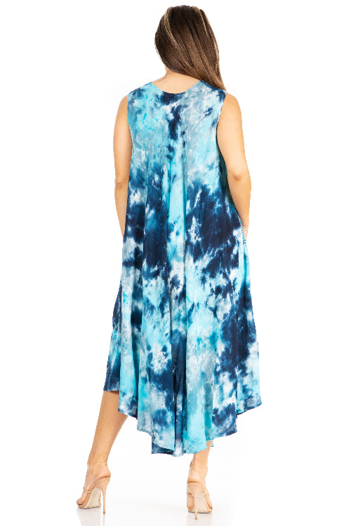 Woman wearing a blue tie-dye dress on a white background