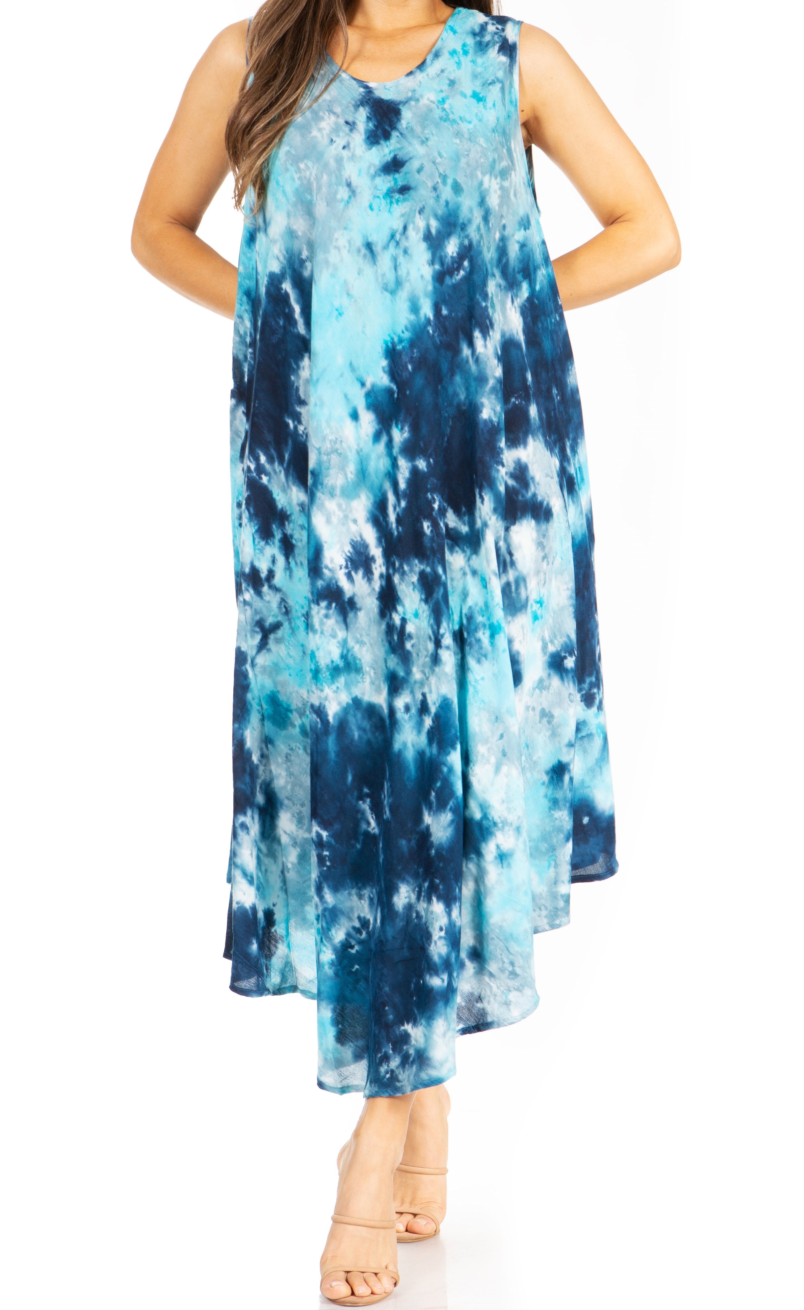 Woman wearing a blue tie-dye dress on a white background