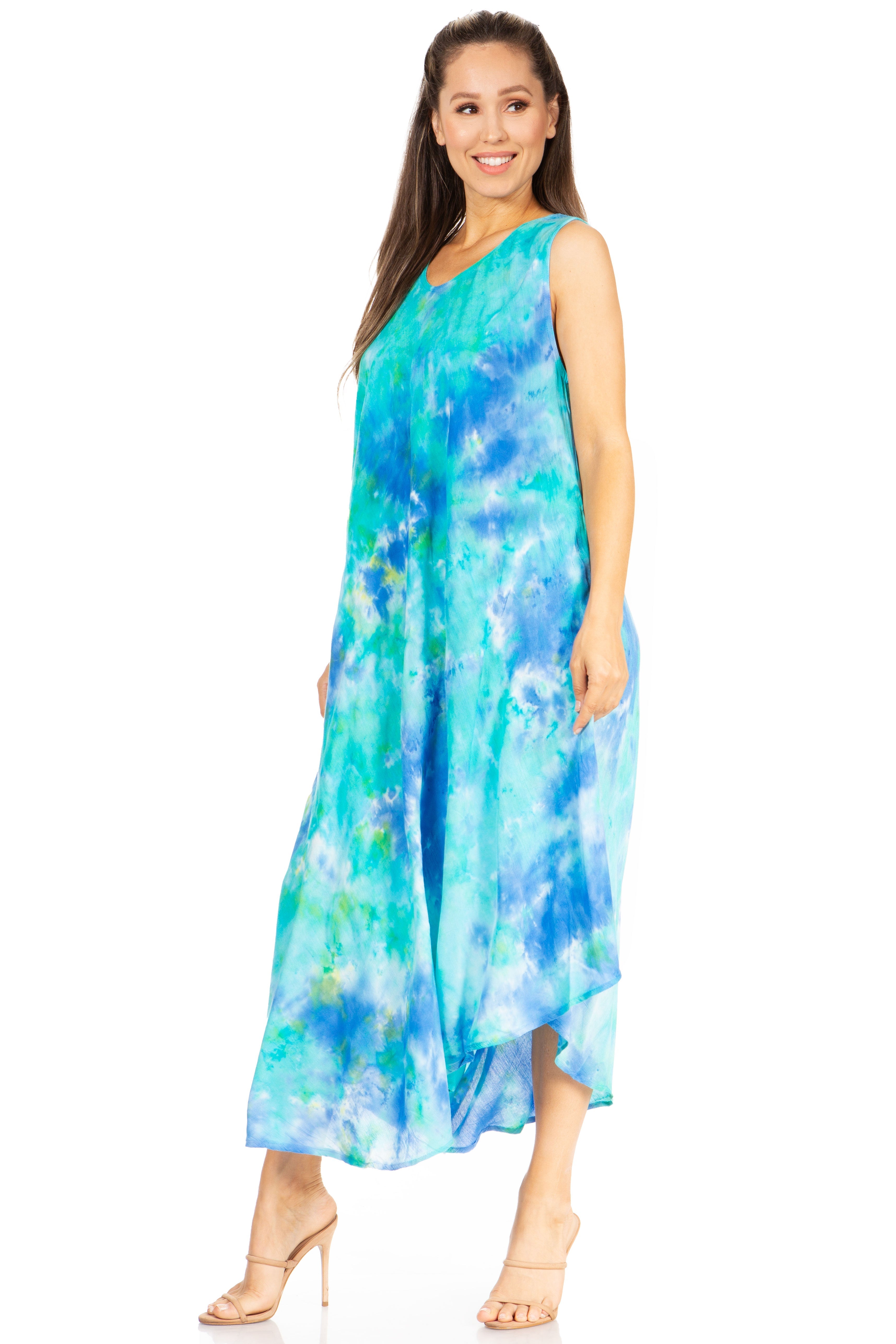 Woman wearing a blue and green tie-dye dress on a white background