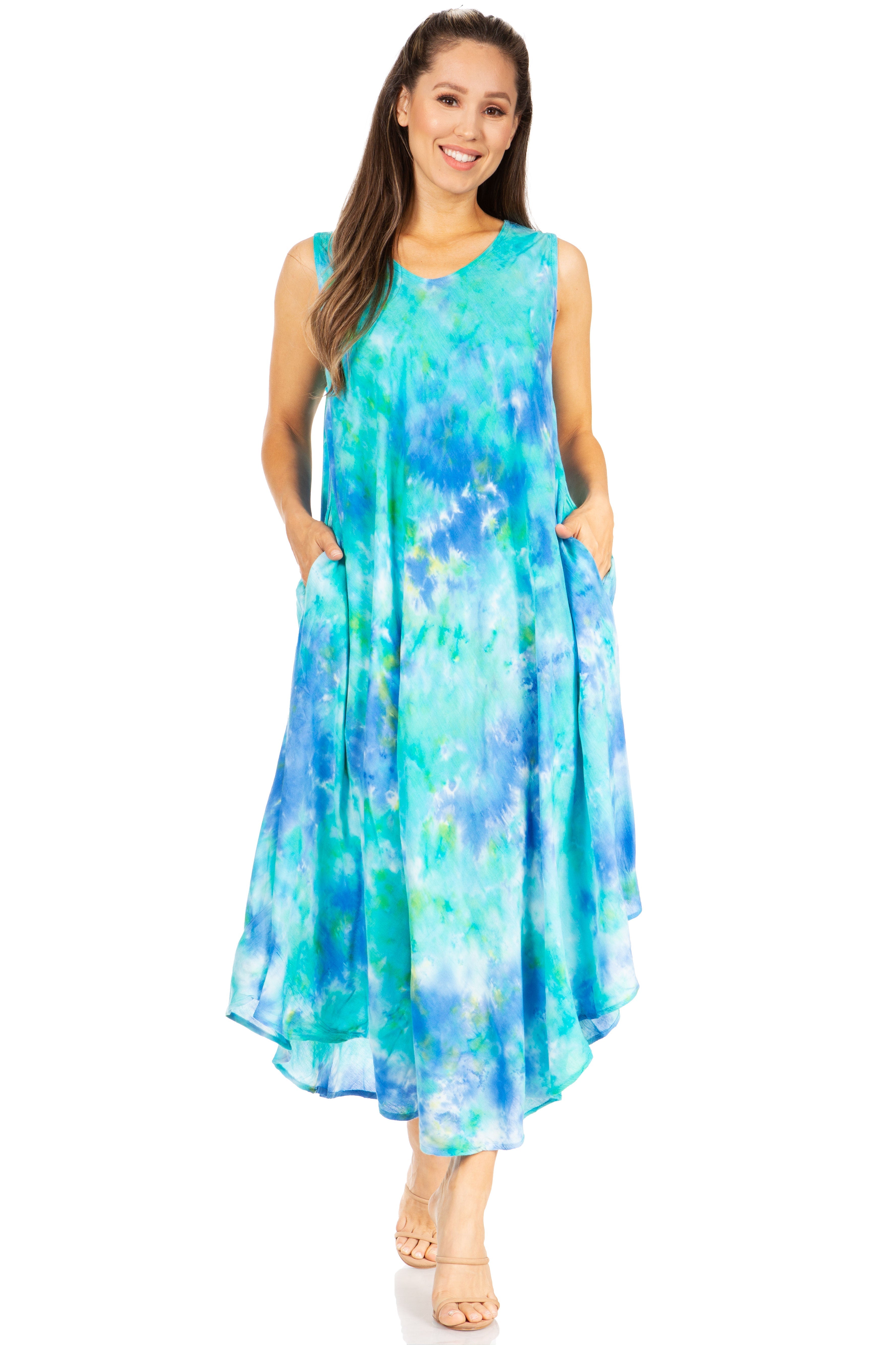 Woman wearing a sleeveless, floral-patterned dress on a white background