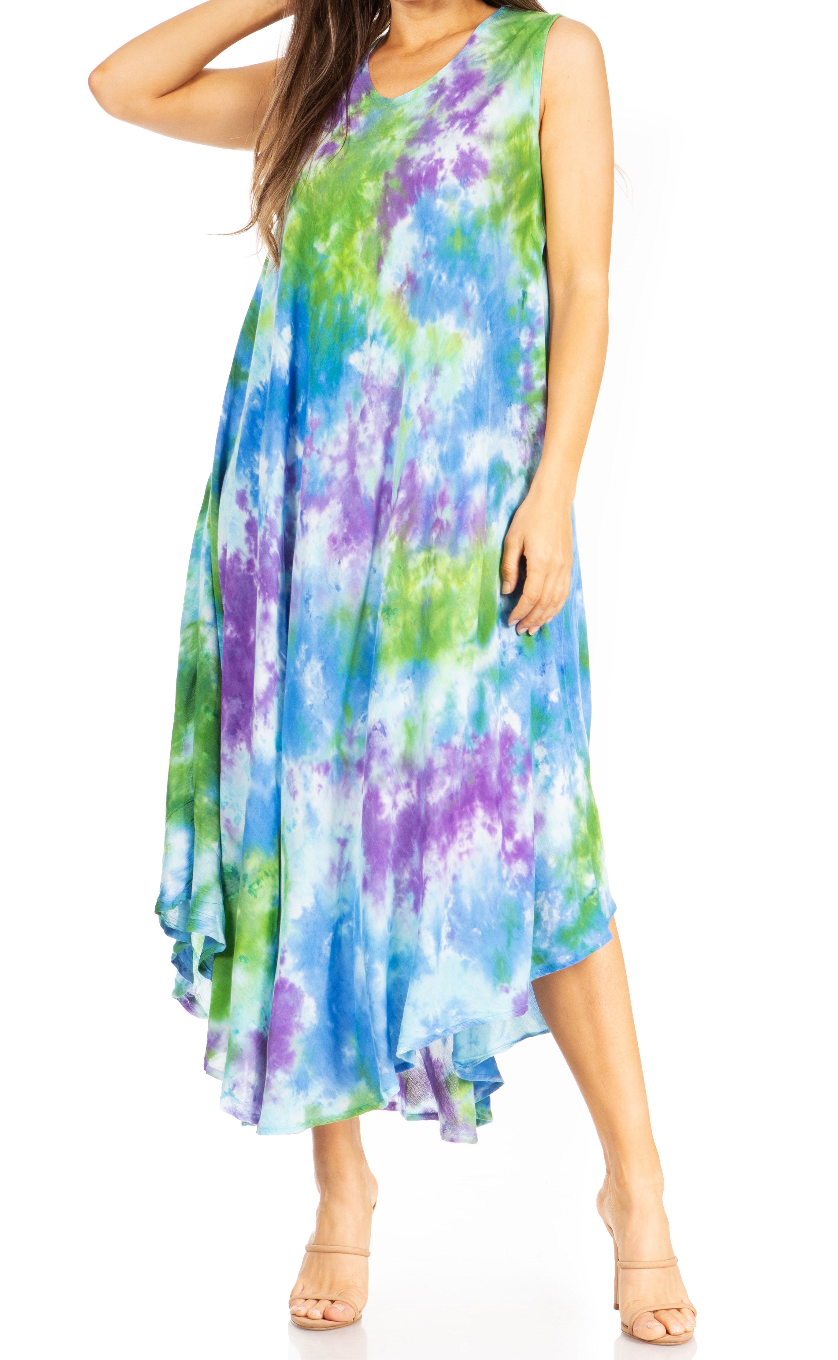 Multicolored tie-dye dress worn by a model on a white background