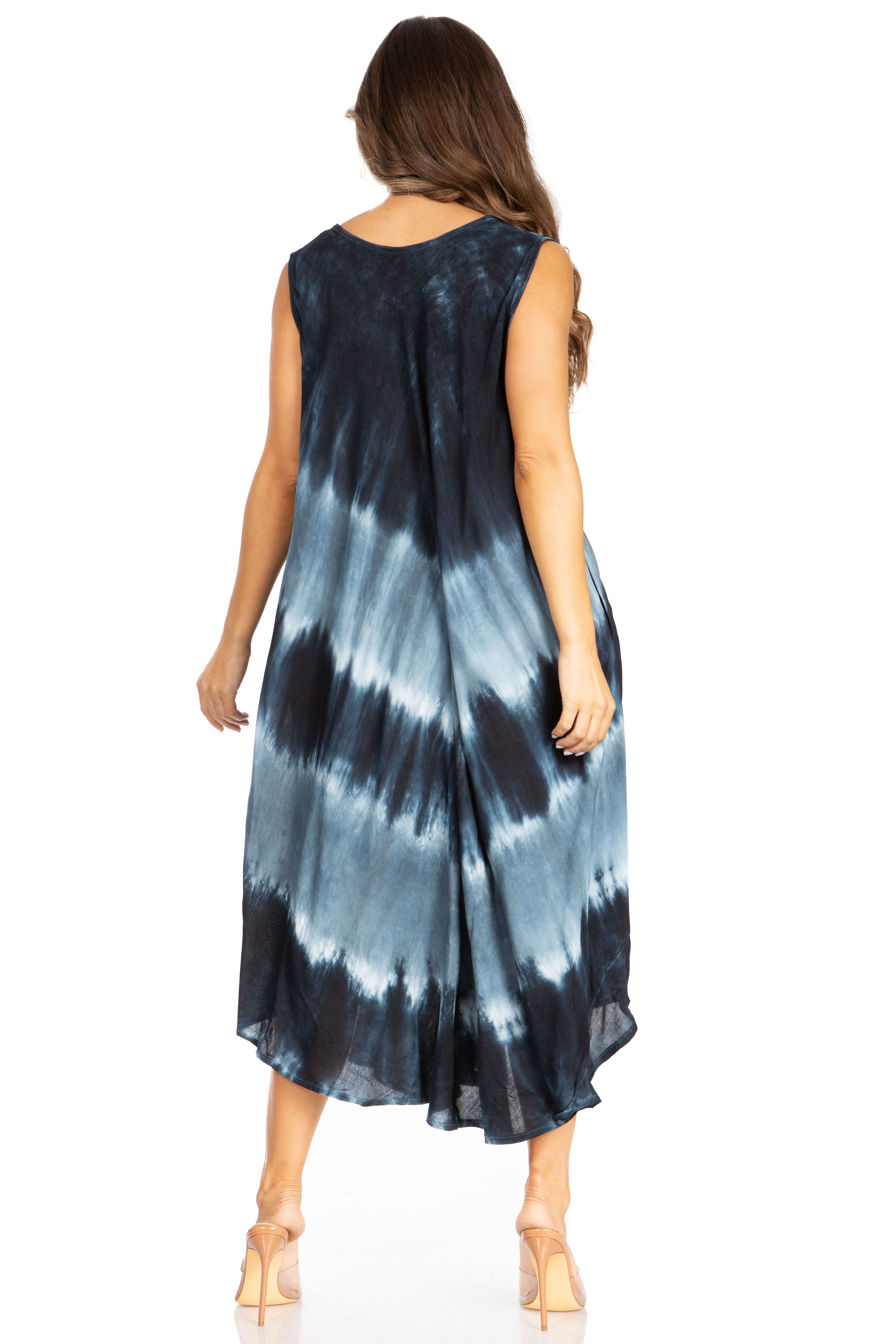 Woman wearing a tie-dye dress with a white background