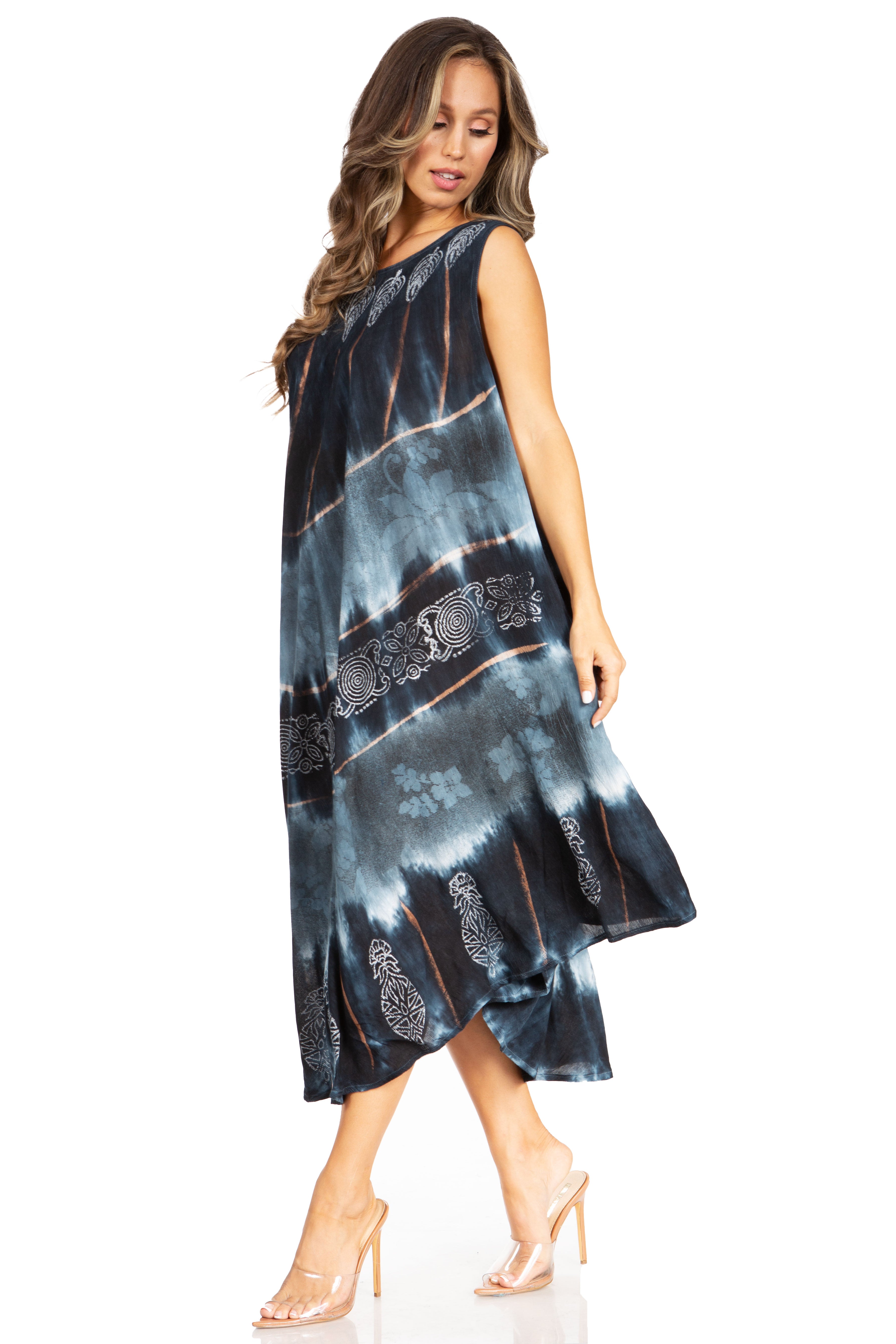 Woman wearing a tie-dye dress with lace details on a white background