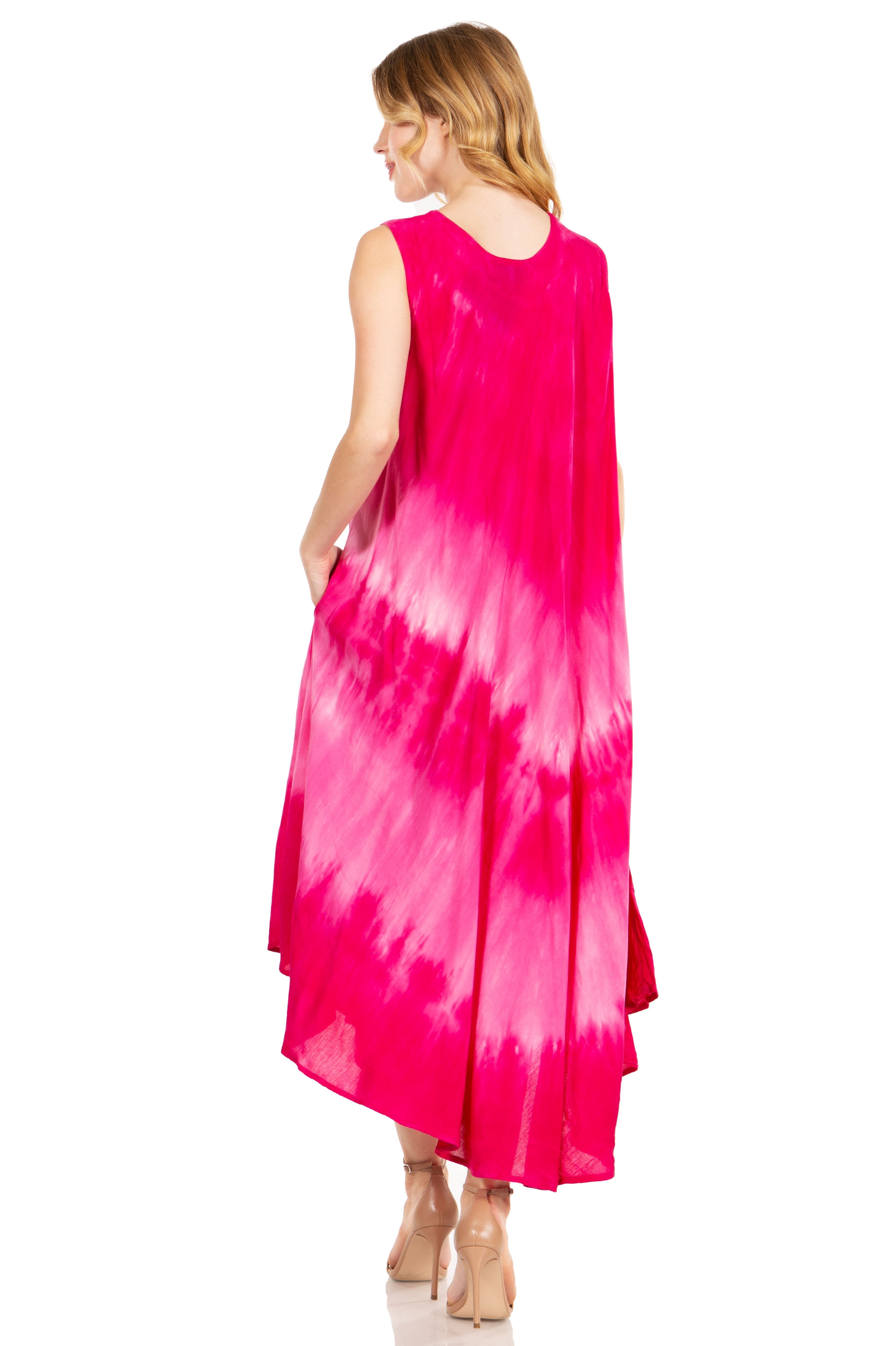 Woman wearing a pink tie-dye dress on a white background