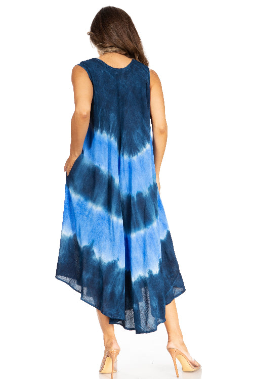 Woman wearing a blue tie-dye dress on a white background