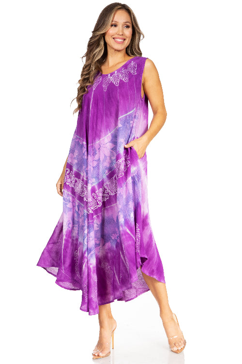 Woman wearing a purple dress with floral patterns on a white background