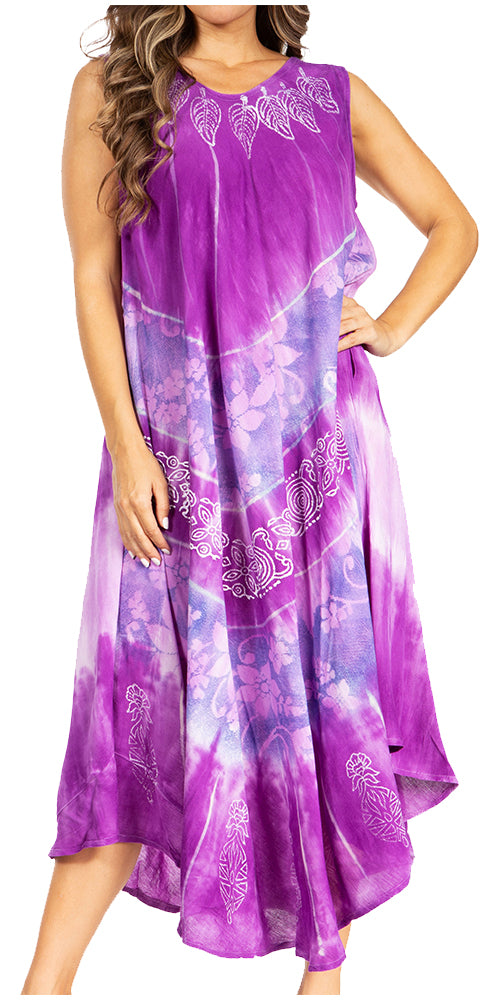 Woman wearing a sleeveless purple dress with floral patterns.