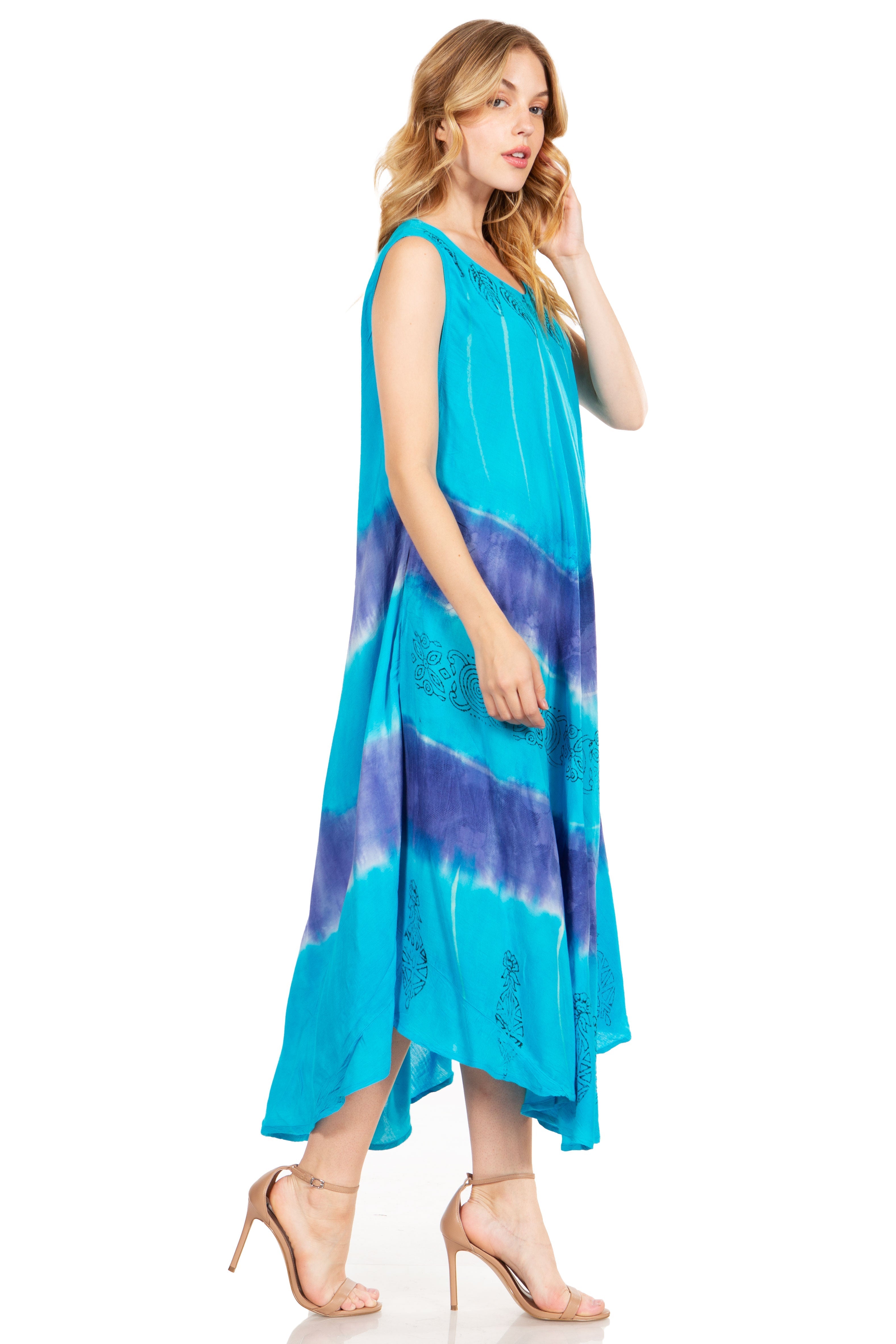 Woman wearing a blue and purple striped dress on a white background