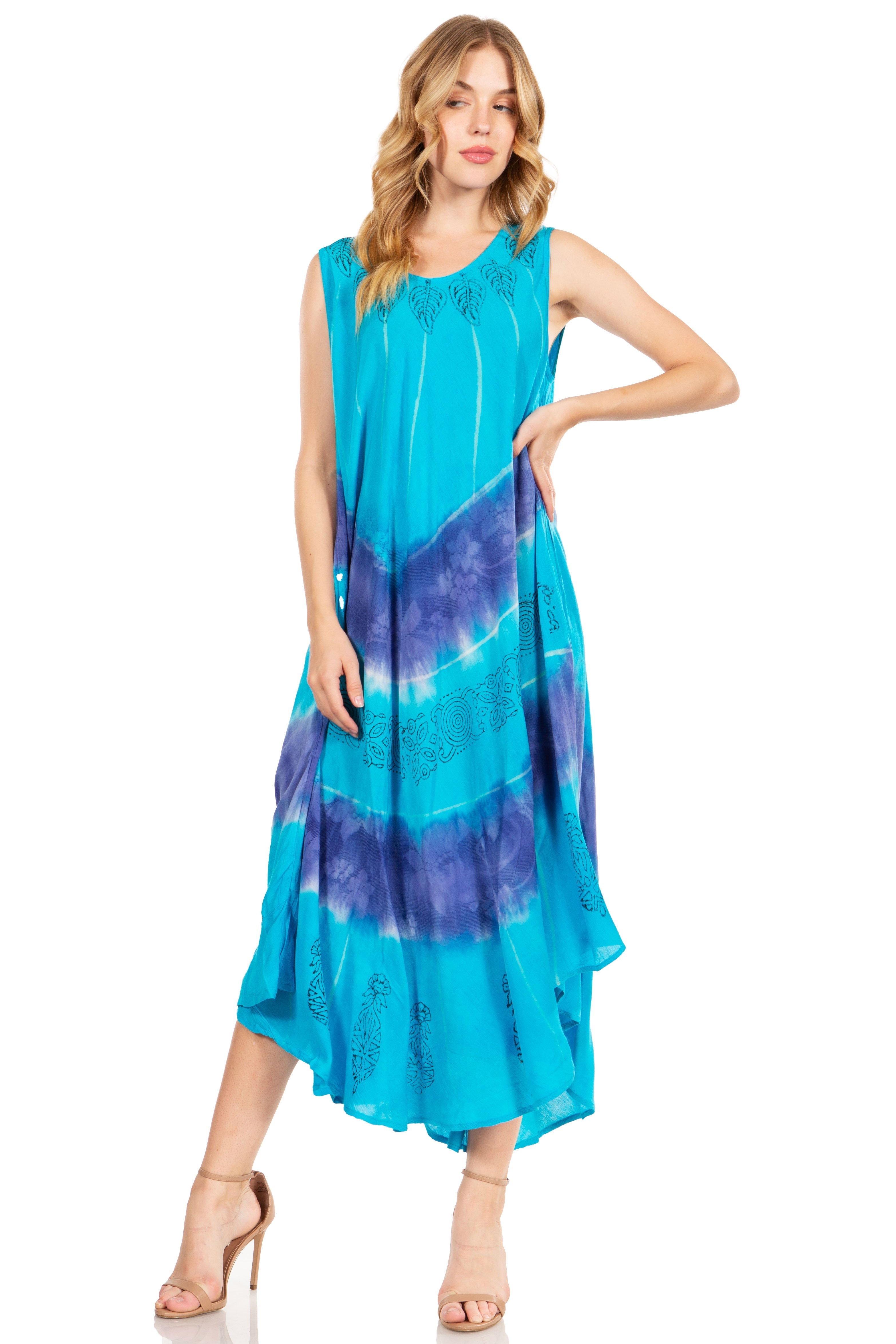 Woman wearing a blue and purple tie-dye dress on a white background