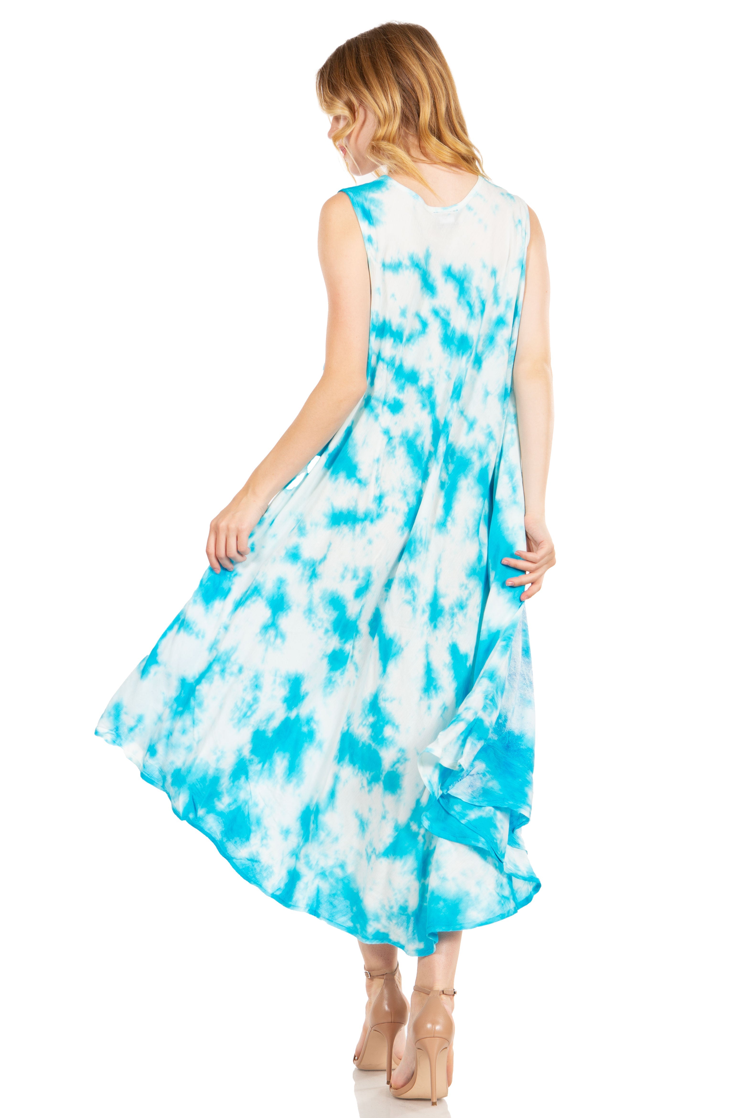 Woman wearing a blue and white tie-dye dress on a white background