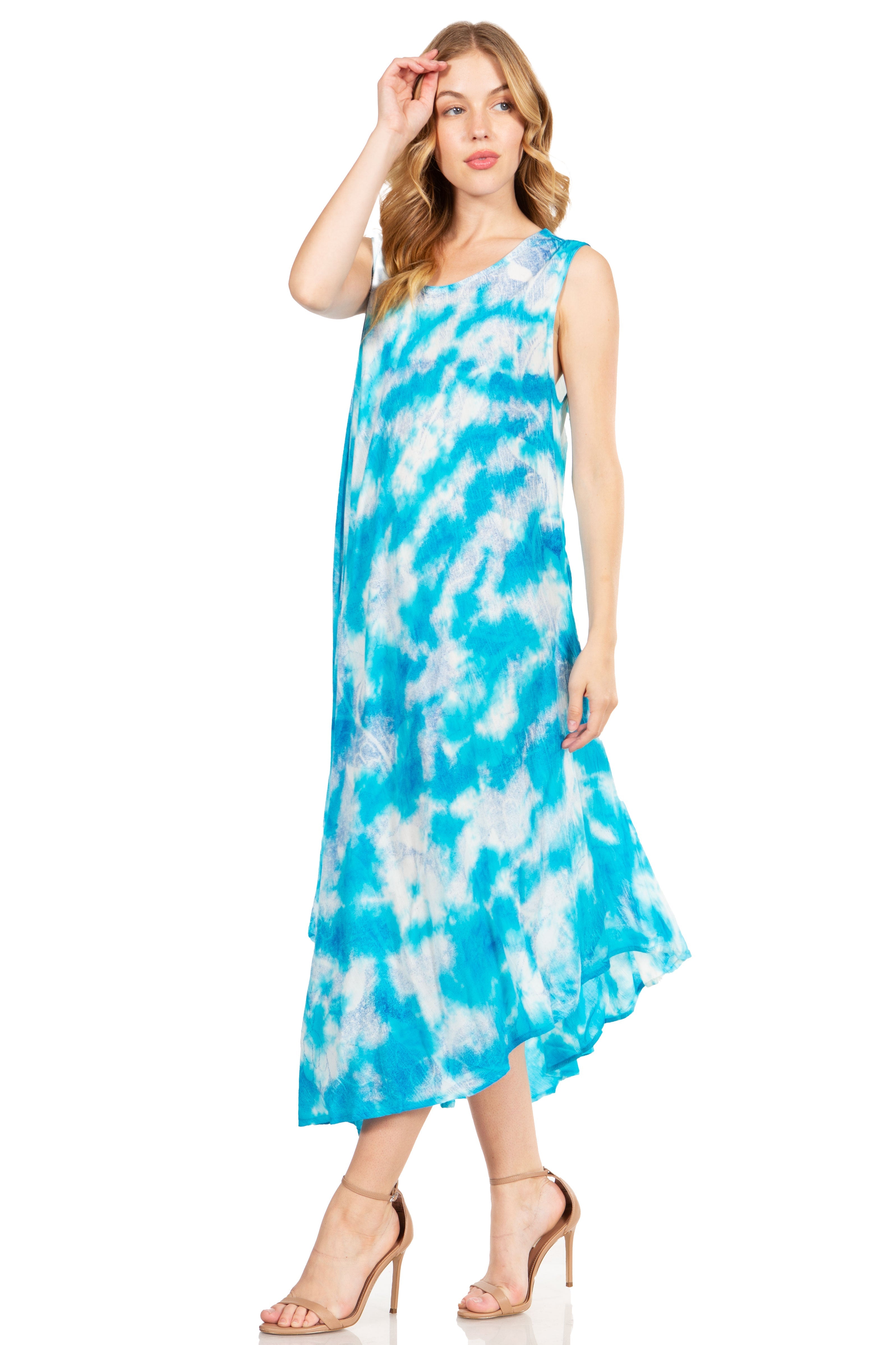 Woman wearing a blue and white tie-dye dress on a white background