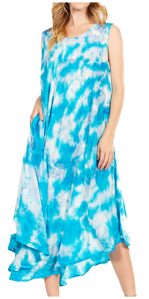 Woman wearing a blue and white tie-dye dress on a white background