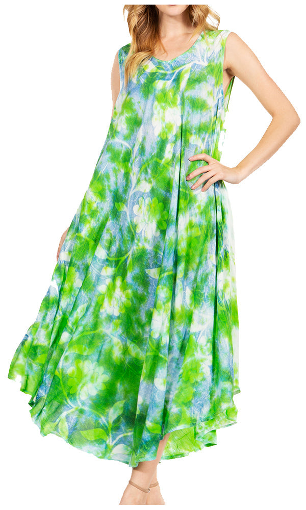 Woman wearing a green and blue patterned dress on a white background