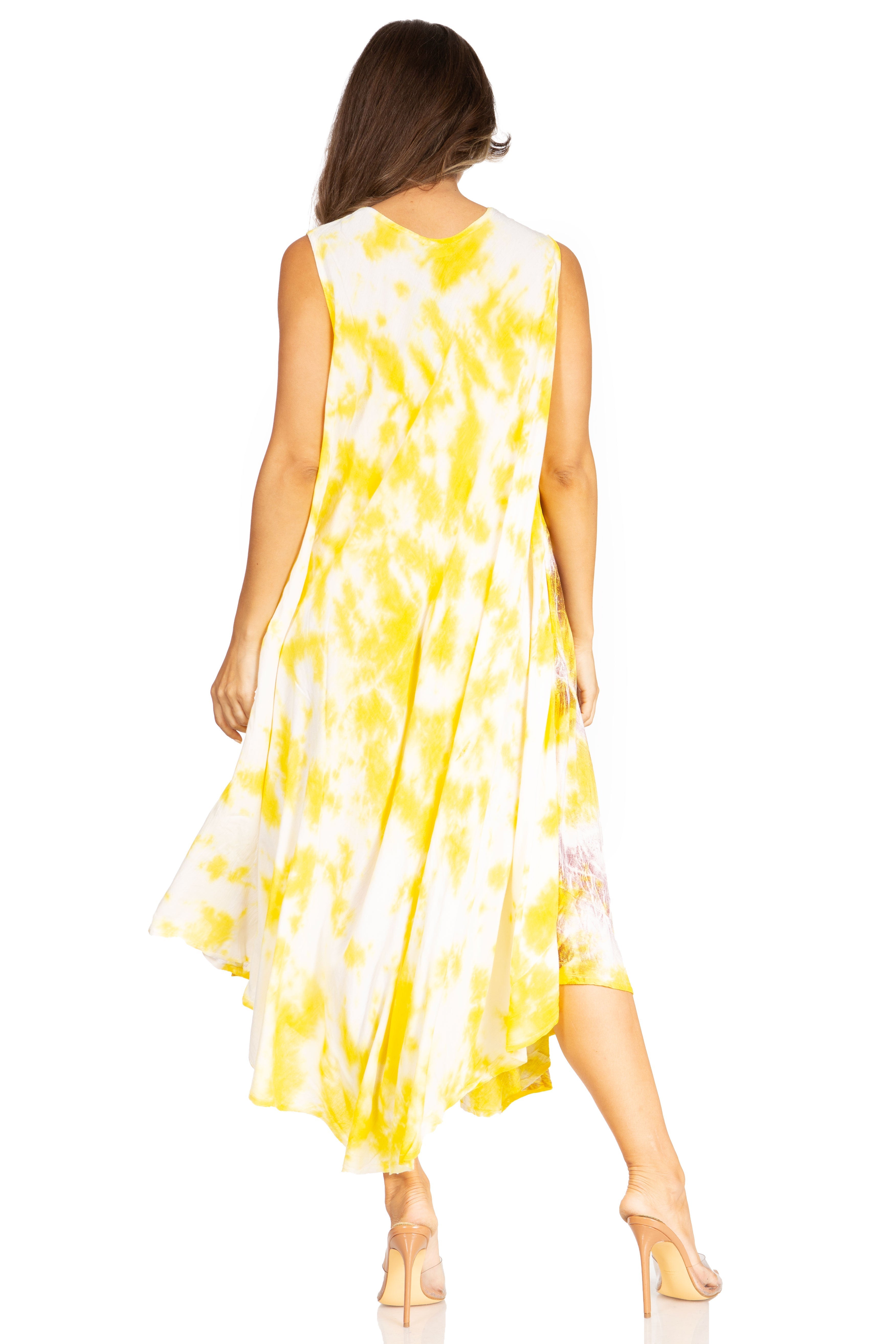 Woman wearing a yellow and white tie-dye dress on a white background