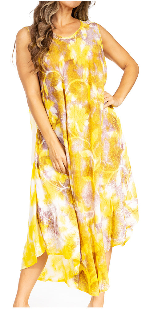 Woman wearing a yellow floral dress on a white background