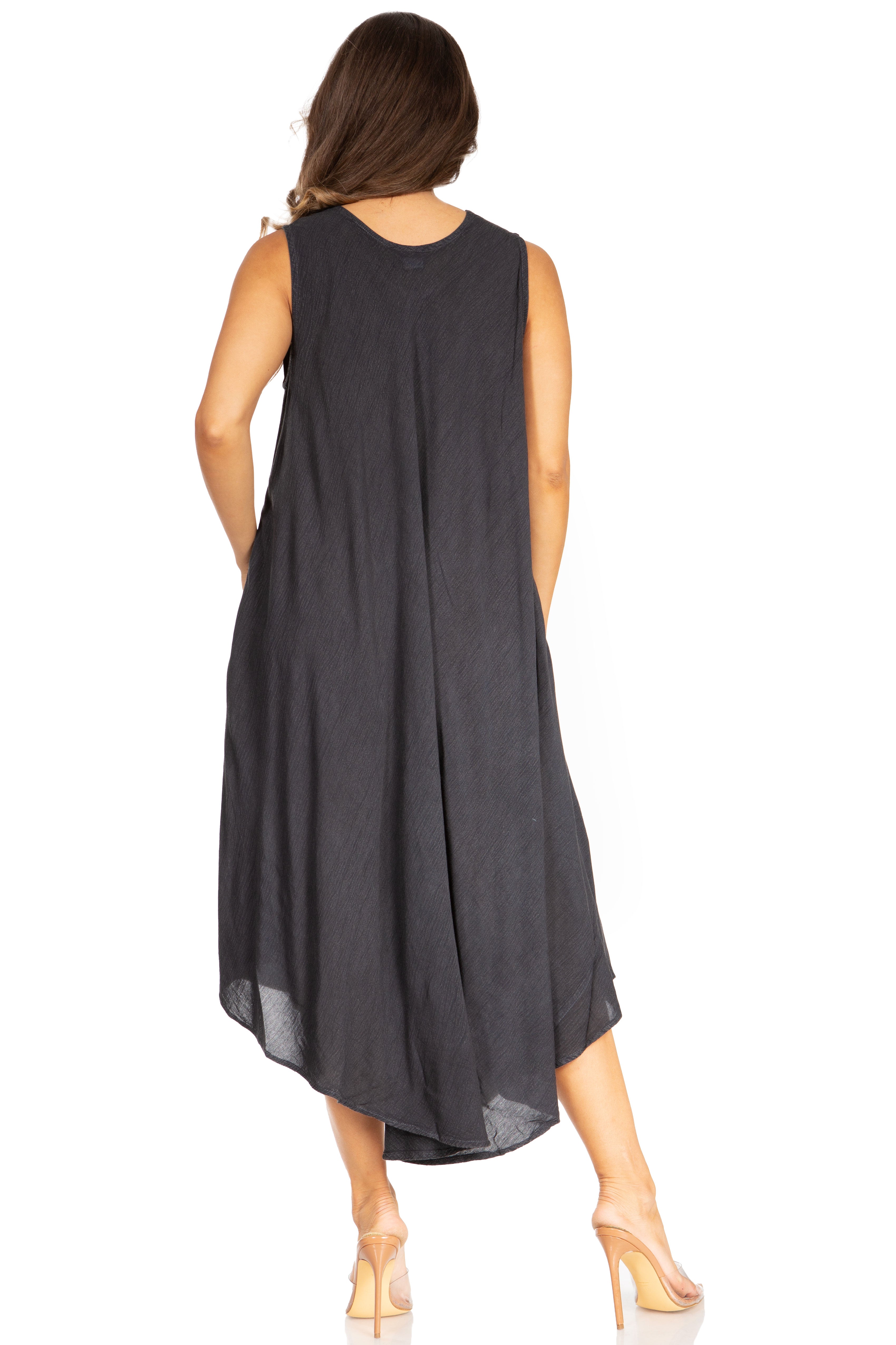 Woman wearing a black sleeveless dress on a white background