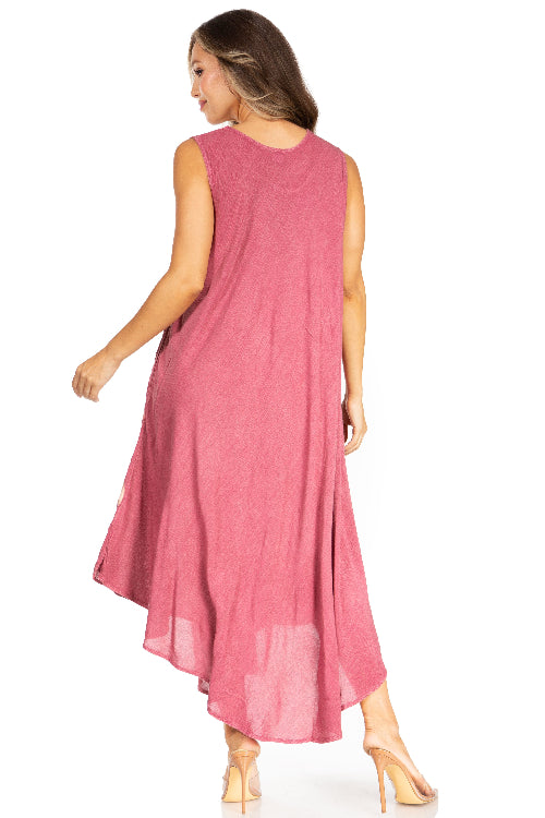 Woman wearing a pink sleeveless dress on a white background