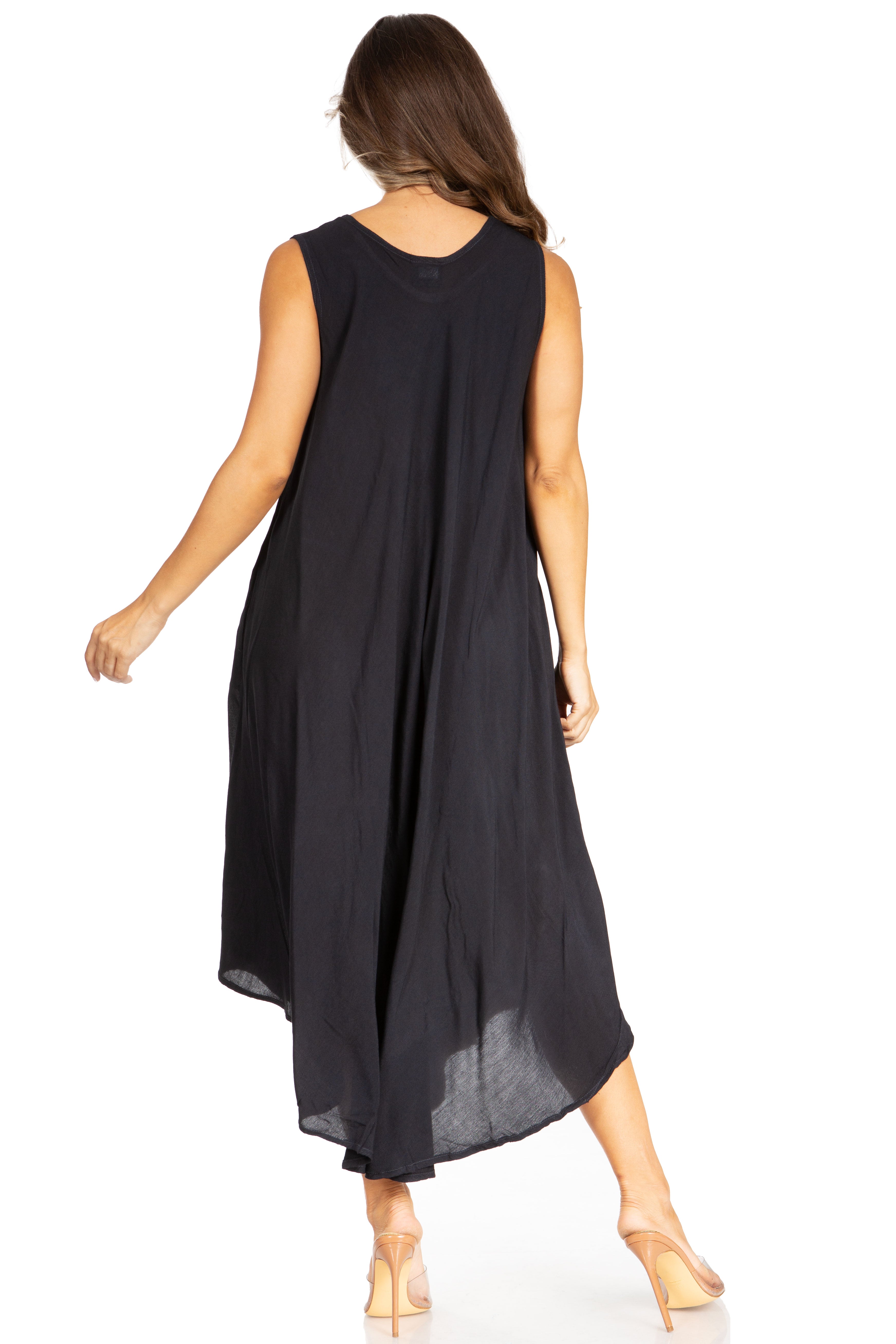 Woman wearing a black sleeveless dress on a white background