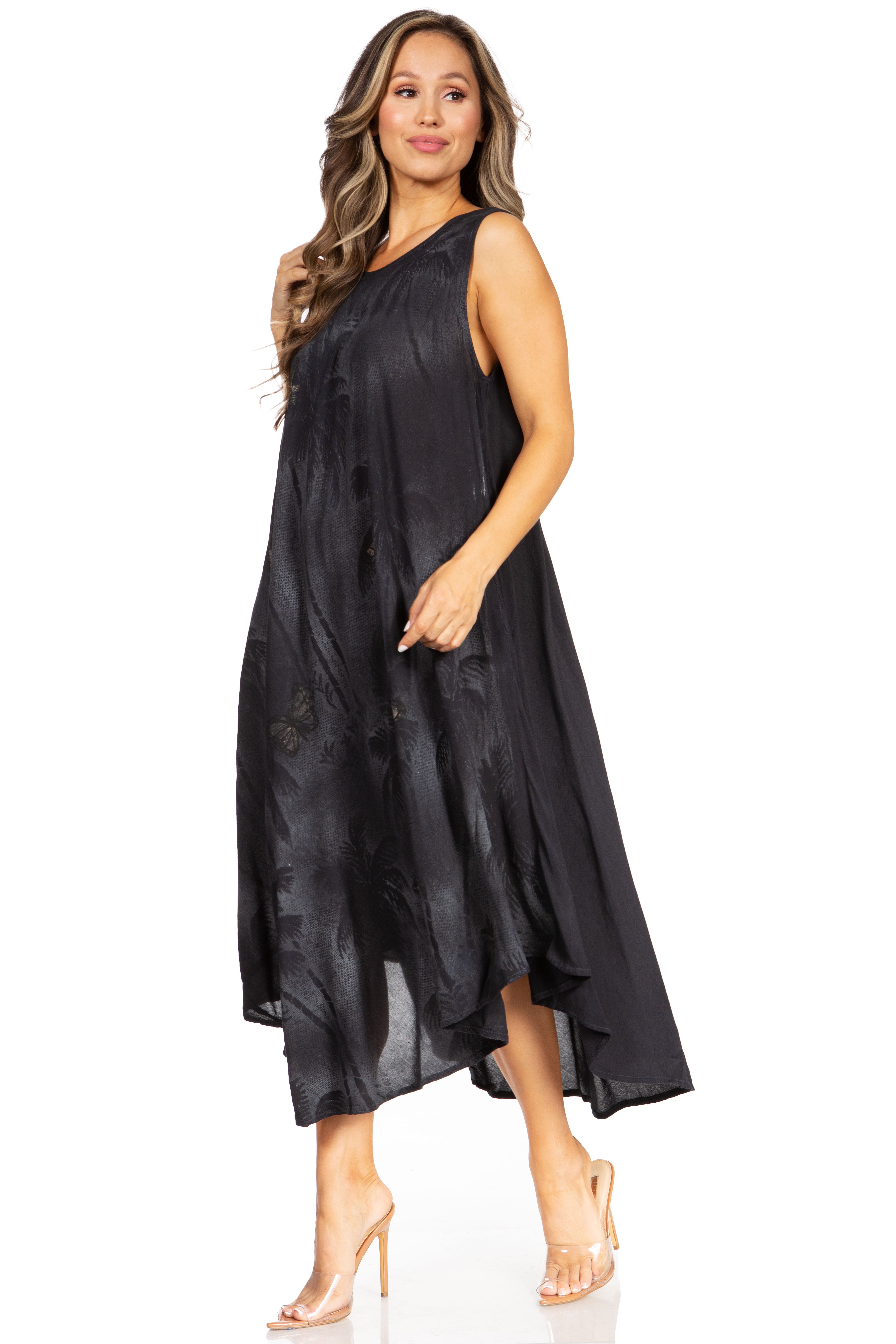 Woman wearing a black sleeveless dress on a white background