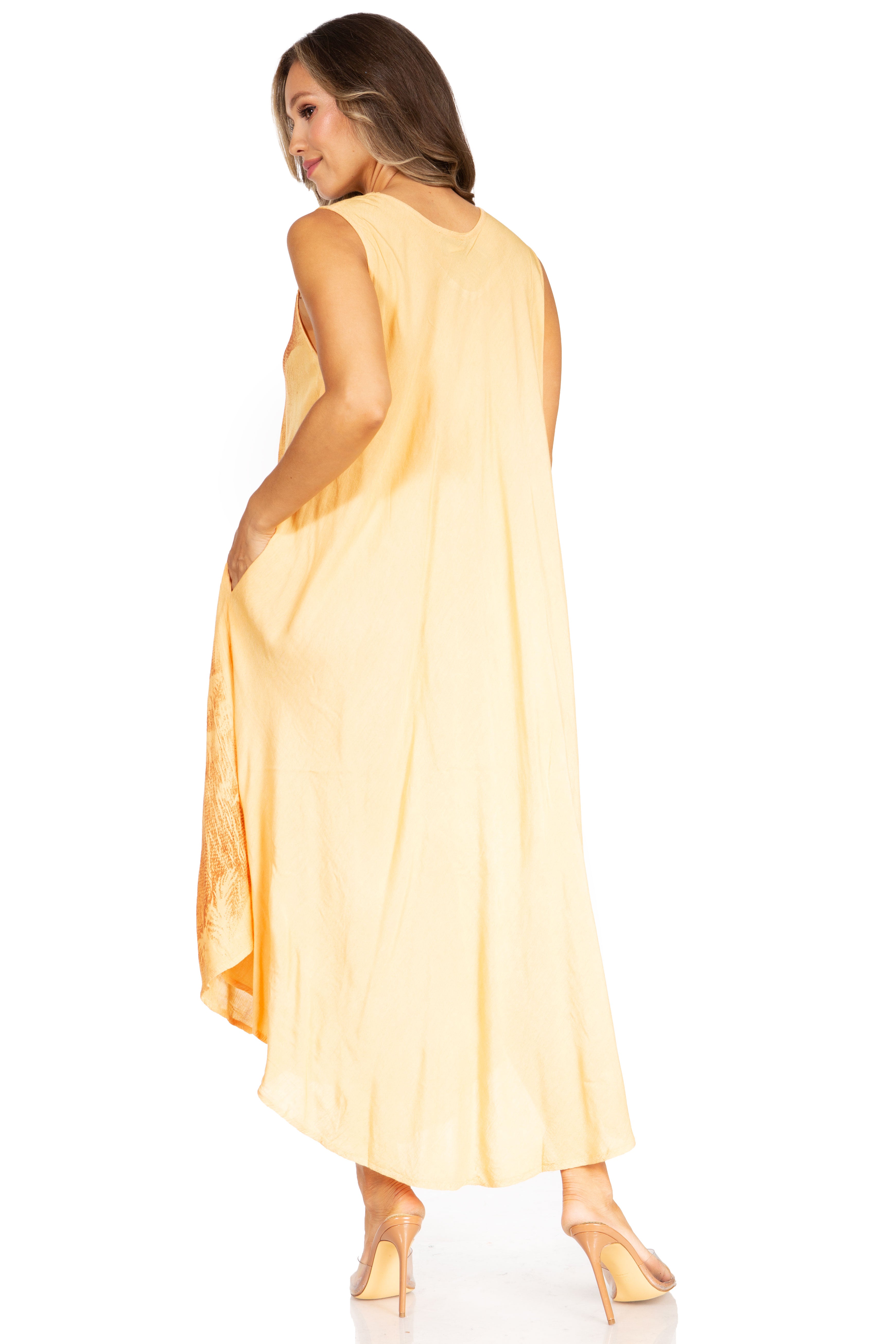 Woman wearing a yellow dress on a white background