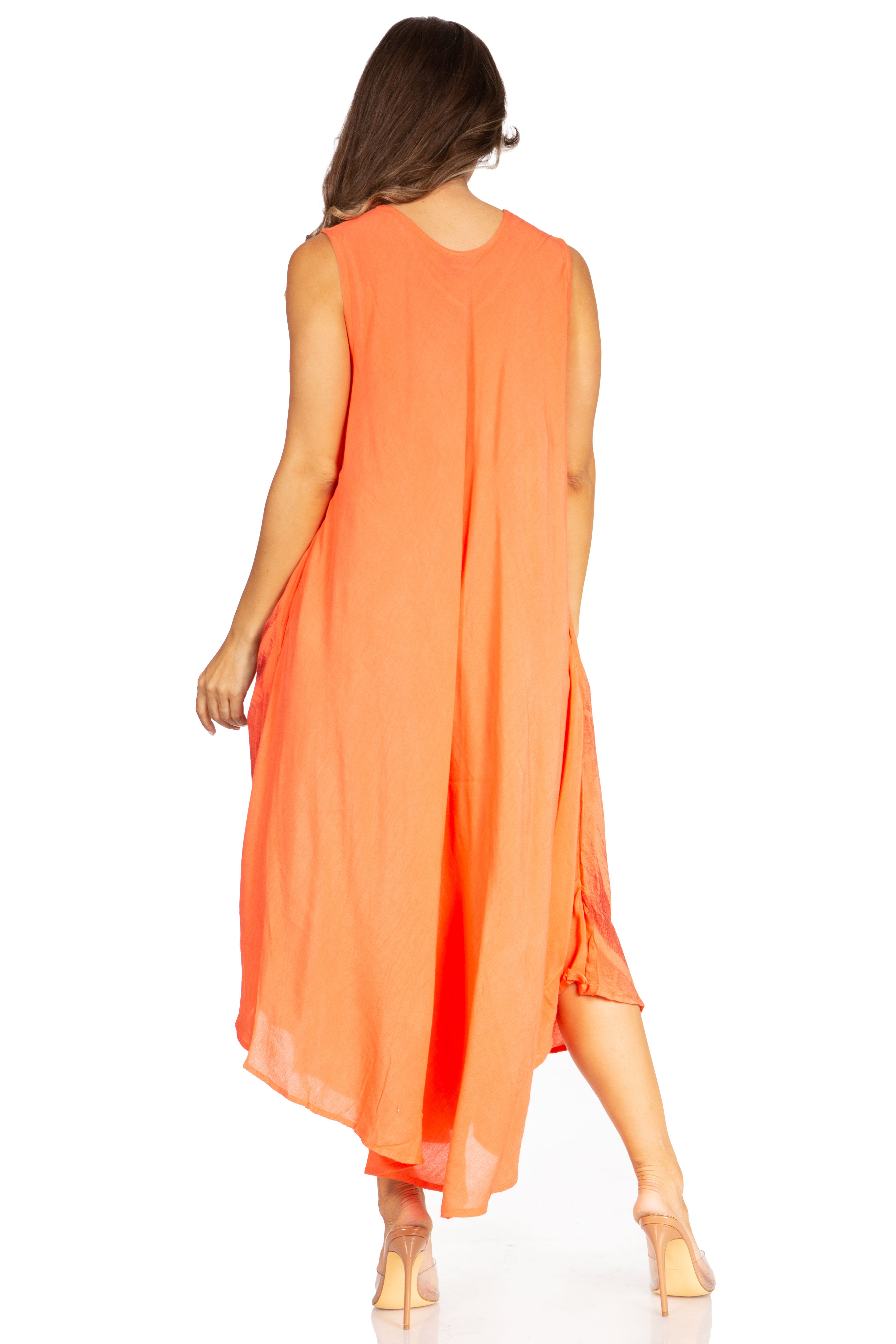 Woman wearing an orange sleeveless dress on a white background