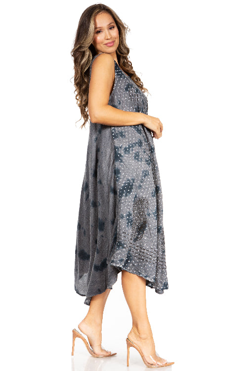 Woman wearing a gray floral dress on a white background