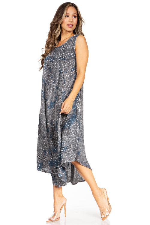 Woman wearing a patterned dress on a white background