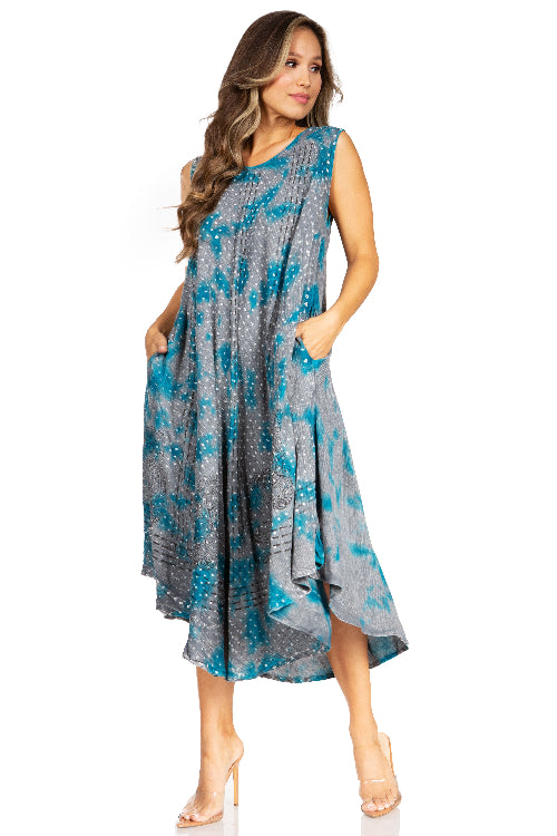Woman wearing a blue and gray patterned dress on a white background