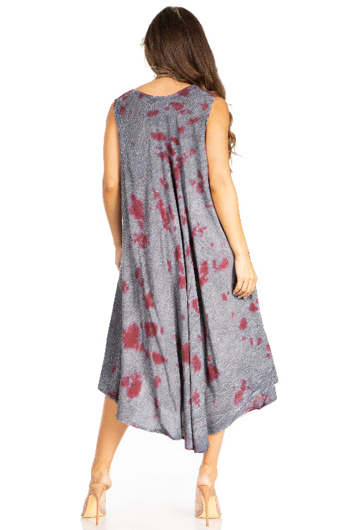 Woman wearing a sleeveless dress with red floral pattern on a white background