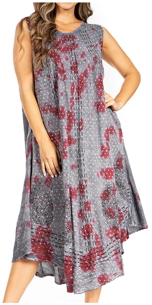Woman wearing a sleeveless dress with red floral pattern on a white background
