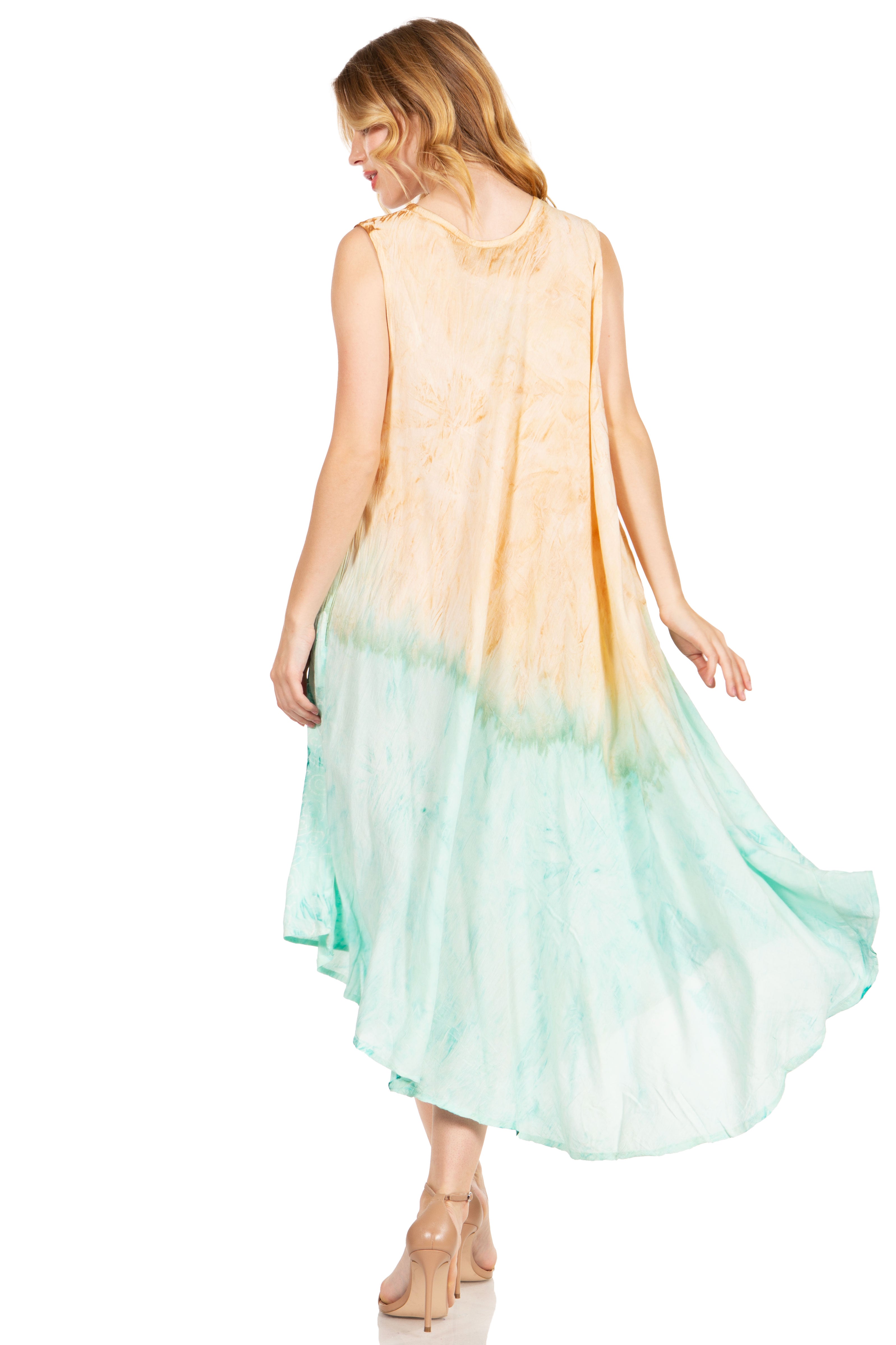 Woman wearing a sleeveless dress with a gradient from yellow to green on a white background