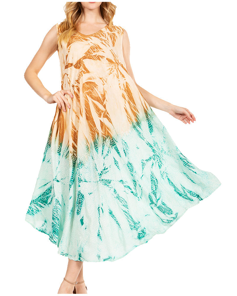 Woman wearing a sleeveless dress with a colorful leaf pattern on a white background