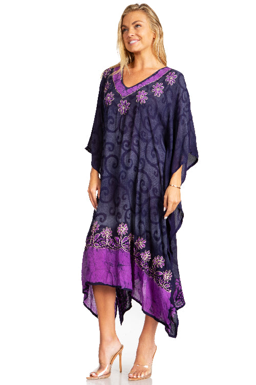 Woman wearing a purple and black patterned dress on a white background