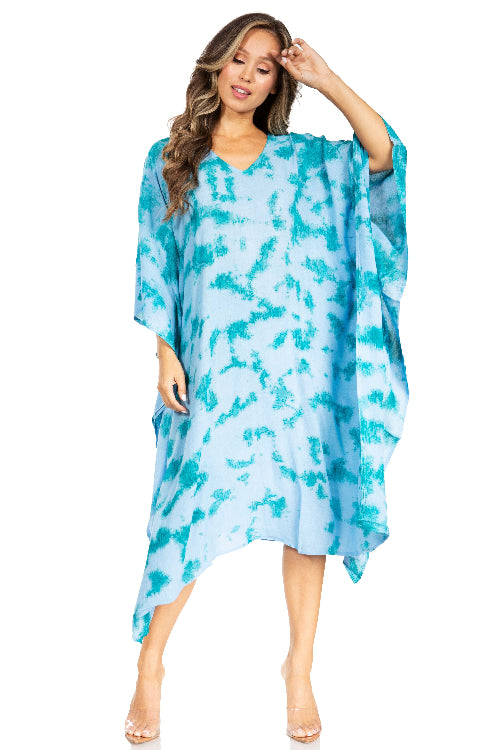 Woman wearing a blue and white patterned dress on a white background
