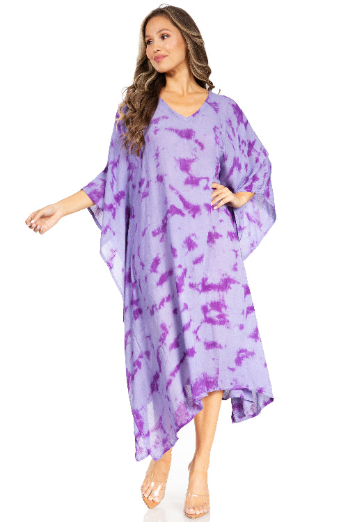 Woman wearing a purple tie-dye dress on a white background