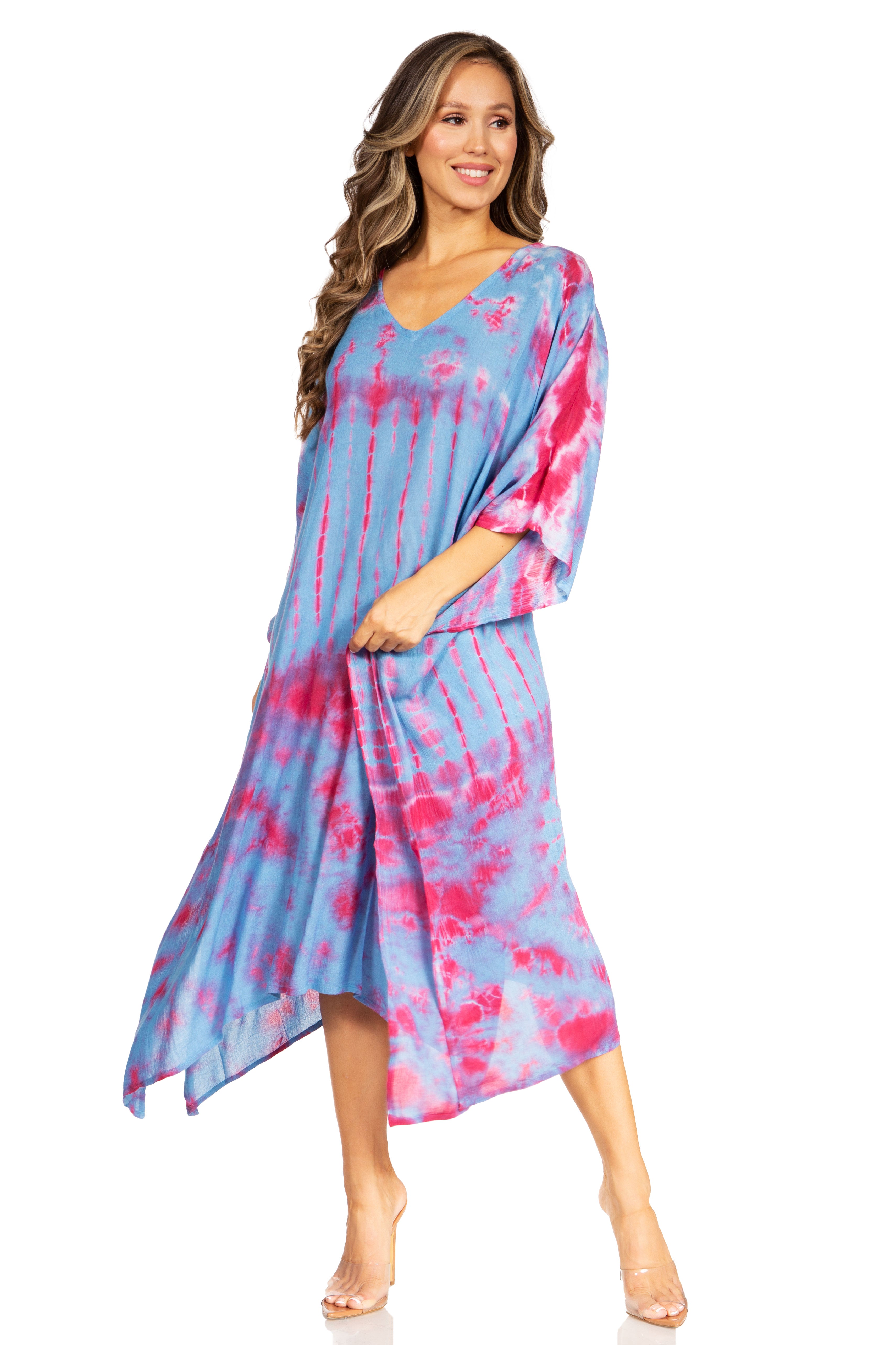 Woman wearing a blue and pink tie-dye dress on a white background