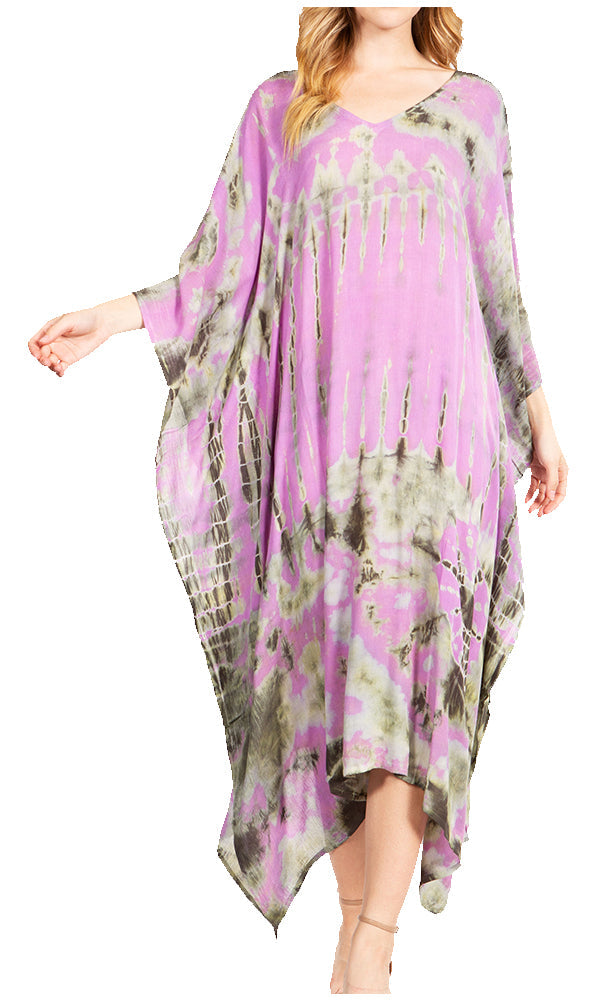 Woman wearing a purple and green floral dress on a white background
